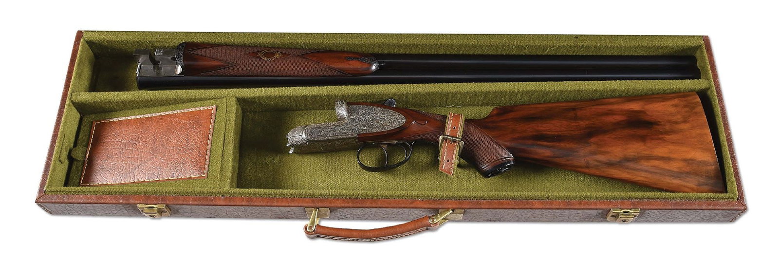 (M) ENGRAVED FRANCHI MONTE CARLO SIDE BY SIDE SHOTGUN WITH CASE.: Circa 1956. A 12 bore game gun with 2 - 3/4" chambered chopper lump blued barrels. Barrels are furnished with ejectors, filed concave tapered game rib, and a round front bead sight. Barrels also have