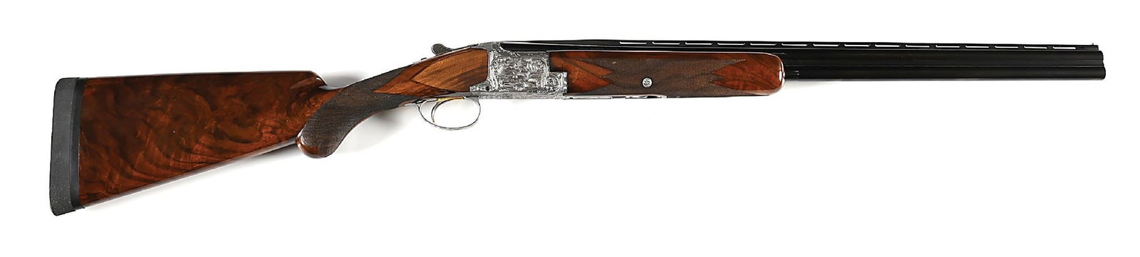 (C) MARECHAL SIGNED BROWNING DIANA GRADE SUPERPOSED 20 BORE OVER/UNDER SHOTGUN.: Manufactured in Belgium in 1967. The blued Special Steel superposed barrels have ejectors, a matted ventilated rib, and single bead sight. Coin finished action is engraved in Diana grade fashion with