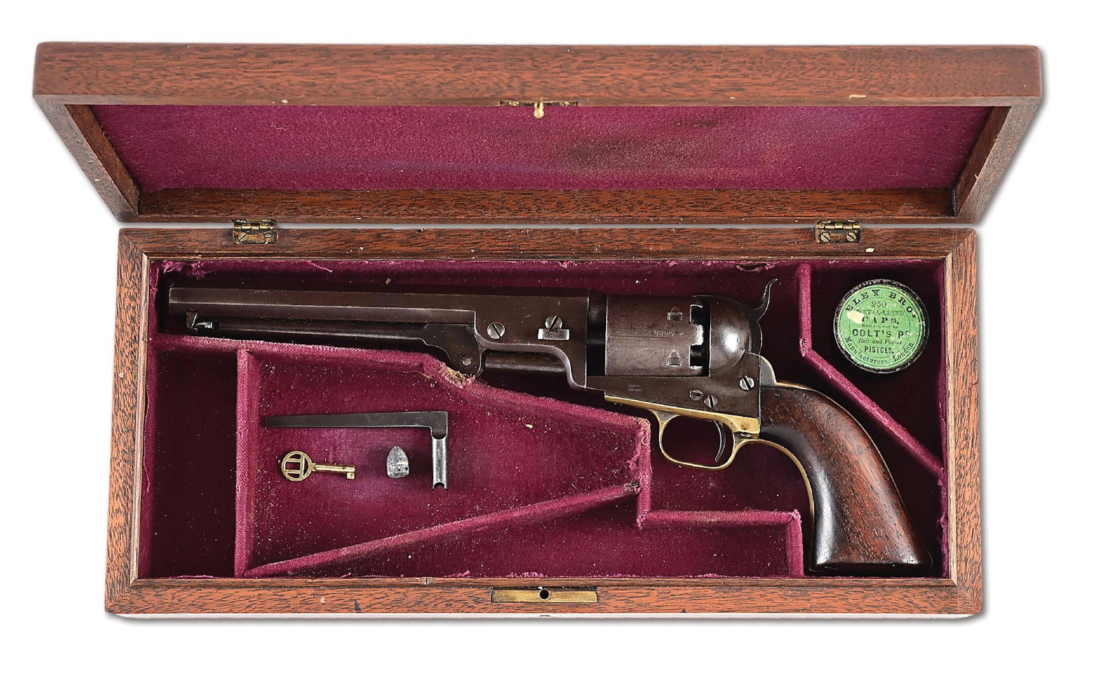 (A) CASED COLT MODEL 1851 NAVY PERCUSSION REVOLVER (1852): This nice, all original early Colt 1851 Navy was produced in 1852 and has all matching serial numbers, including the wedge. The top of the barrel flat has a clear New York address. CONDITION: Overall,