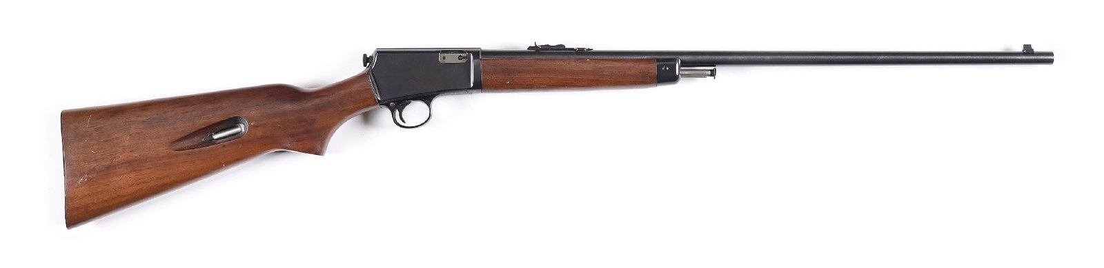 (C) WINCHESTER MODEL 63 SEMI-AUTOMATIC RIFLE WITH BOX: Dates to 1958. Standard features include the grooved receiver, blue finish, take down, dovetailed front sight, flat top rear sporting sight, plain walnut stock with pistol grip, checkered metal buttpl