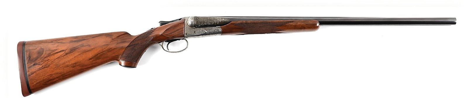 (C) A.H. FOX HAMMERLESS D GRADE 12 BORE SIDE BY SIDE SHOTGUN: Dates to 1910. The engraved box lock features a hunter with dog on left side and a single dog on the other, both surrounded by American scroll engraving. The water table is stamped D for grade. All nu