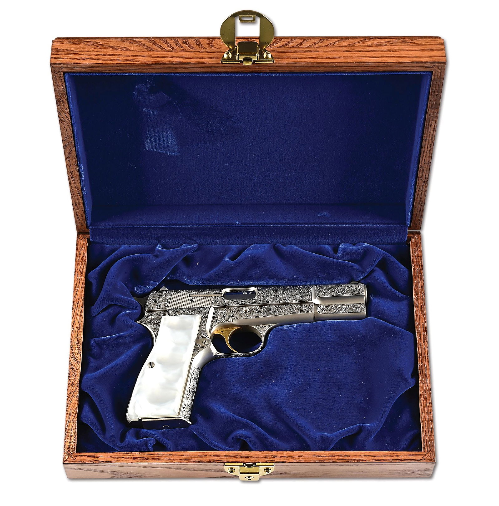 (C) ENGRAVED BELGIUM BROWNING RENAISSANCE HI-POWER SEMI-AUTOMATIC WITH DISPLAY CASE: This pistol dates to 1974. It is one of the most factory ornate and engraved Hi Powers ever produced. The Germanic oak leaf scroll engraving encompasses nearly the entirety of this pistol. Finish is i