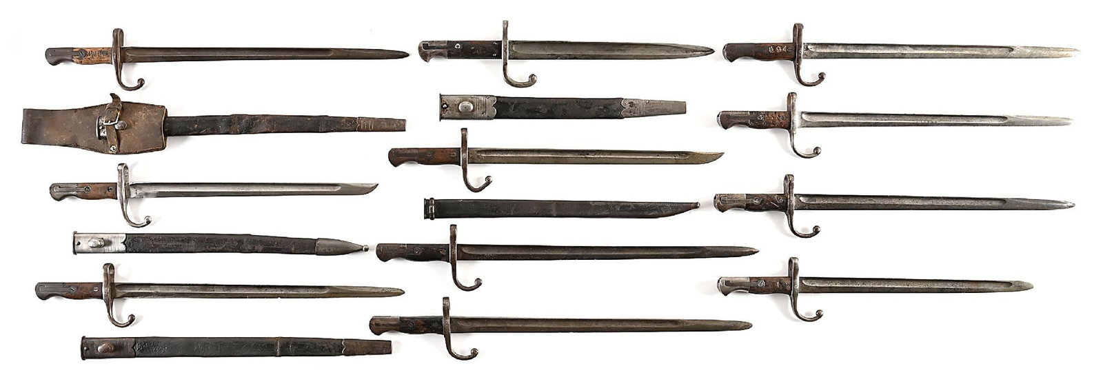 LOT OF 11: IMPERIAL JAPANESE TYPE 18 MURATA BAYONETS.: Lot contains 11 Imperial Japanese Type 18 Murata bayonets which were for the Meiji 18 Murata Rifle. Five bayonets have scabbards and one is housed in a Type 30 bayonet scabbard. One has a leather frog