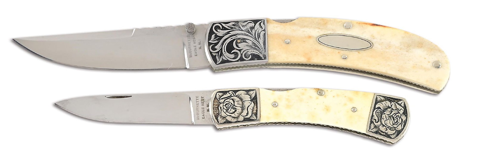 LOT OF 2: HARVEY MCBURNETTE ENGRAVED LOCKBACK FOLDERS.: Lot consists of: (A) Satin finished clip point blade with checkered thumbstud. Blade is marked "McBURNETTE / EAGLE NEST / N.M." on obverse ricasso. Spine is fileworked as well as the stainless steel b