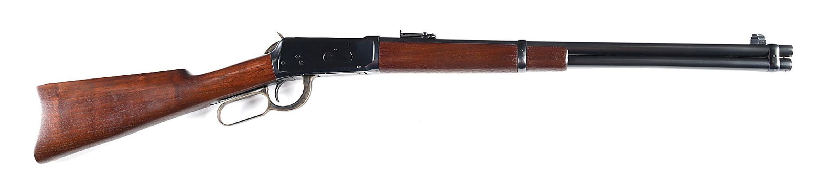 (C) WINCHESTER MODEL 1894 LEVER ACTION SADDLE RING CARBINE IN .32-40 (1915).: Manufactured 1915. Blue finish with case colored hammer and lever. Round barrel with blade front sight and ladder adjustable carbine sight. Oil finished walnut stocks with steel carbine butt plate. CO