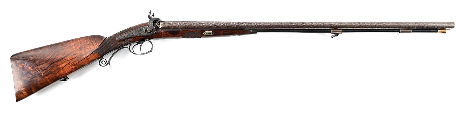 (A) HIGH GRADE & ENGRAVED GERMAN PERCUSSION DOUBLE RIFLE BY F. KUSSMAUL: F. KUSSMAUL CALMBACH inlaid in silver on the rib. Features finely engraved back action locks and dual triggers. The trigger guard and upper tang are finely engraved. The barrels have a lovely browned