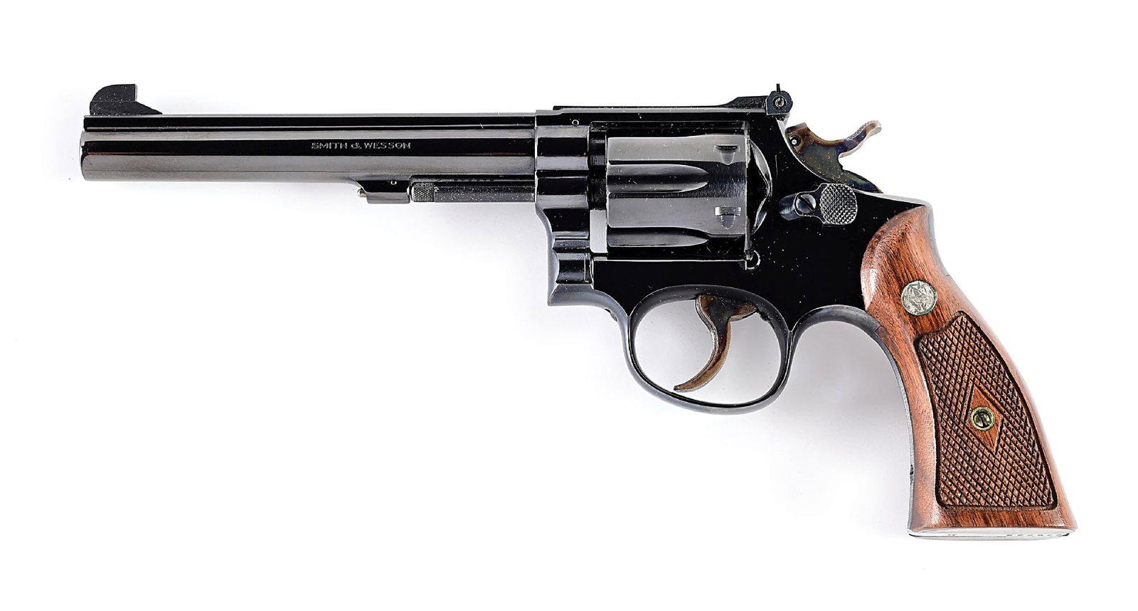 (C) SMITH & WESSON K38 MASTERPIECE DOUBLE ACTION REVOLVER WITH BOX: Dates to 1956. Built on the square butt K-frame, 4-screw with pinned barrel, full rub, adjustable rear sight, blue finish, case color hammer and trigger with S&W silver medallion single diamond checke