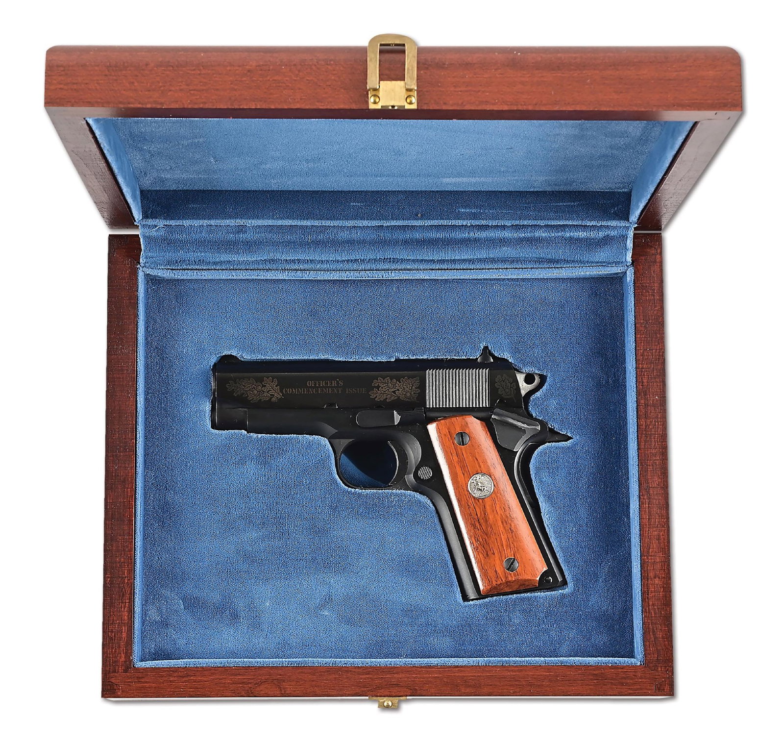 (M) COLT SERIES 80 1911 OFFICERS COMMENCEMENT ISSUE SEMI-AUTOMATIC PISTOL.: The Series 80 was brought out in 1983. This special edition has the silver etching on the right side of the slide representing the Army and Navy. The left side has the etching "OFFICERS COMMENCEMENT I