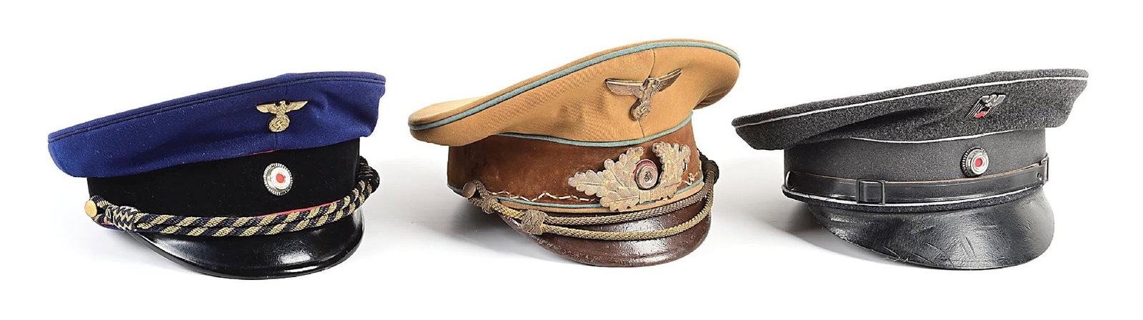 LOT OF 3: THIRD REICH POLITICAL LEADER, REICHSBAHN, AND RED CROSS VISOR CAPS.: Lot contains three German WWII visor caps: (A) NSDAP leader cap has blue piping with light wear (and several tiny moth holes on back), gold chin cord heavy wear, NSDAP gold insignia with moderate wear