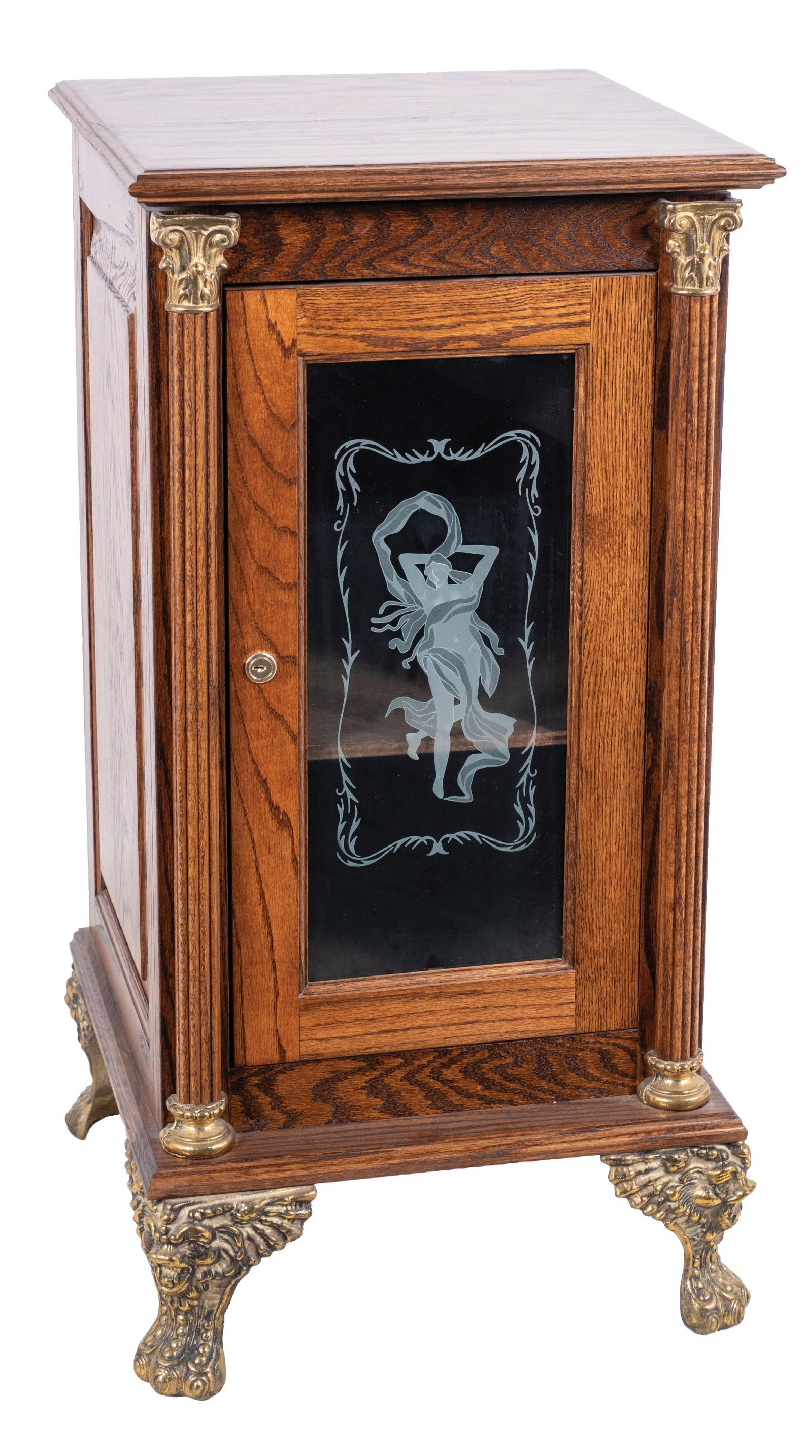 CONTEMPORARY OAK SLOT MACHINE STAND WITH ART NOUVEAU DESIGN: CONDITION: Solid and well made contemporary slot machine stand in oak. Cast paw feet, glass front door, with light wear overall from use. This is not a standard shippable item and will require 3rd par