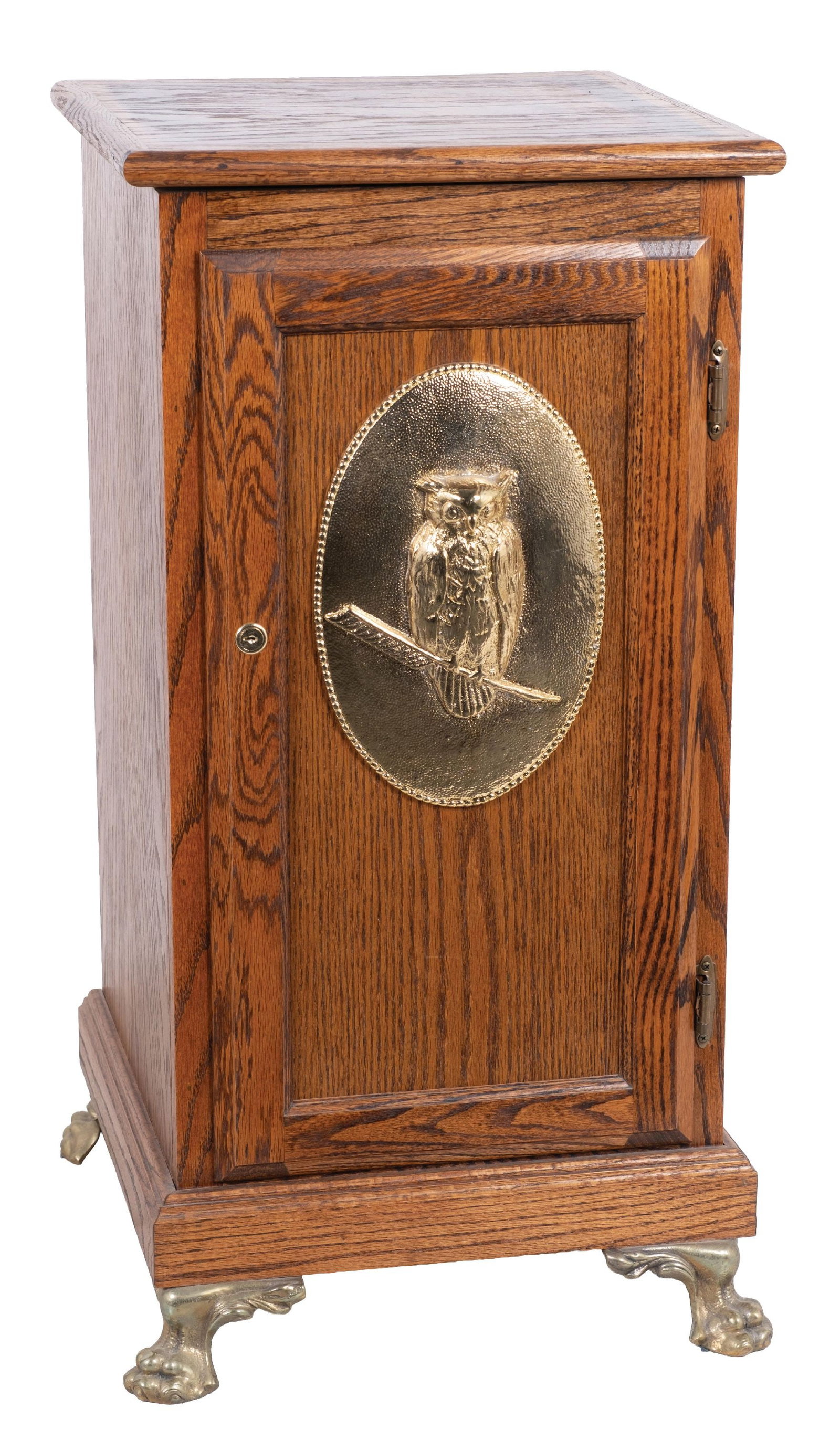 CONTEMPORARY OAK SLOT MACHINE STAND WITH MILLS OWL EMBLEM: CONDITION: Solid and well made contemporary slot machine stand in oak. Cast paw feet, glass front door, with light wear overall from use. This is not a standard shippable item and will require 3rd par
