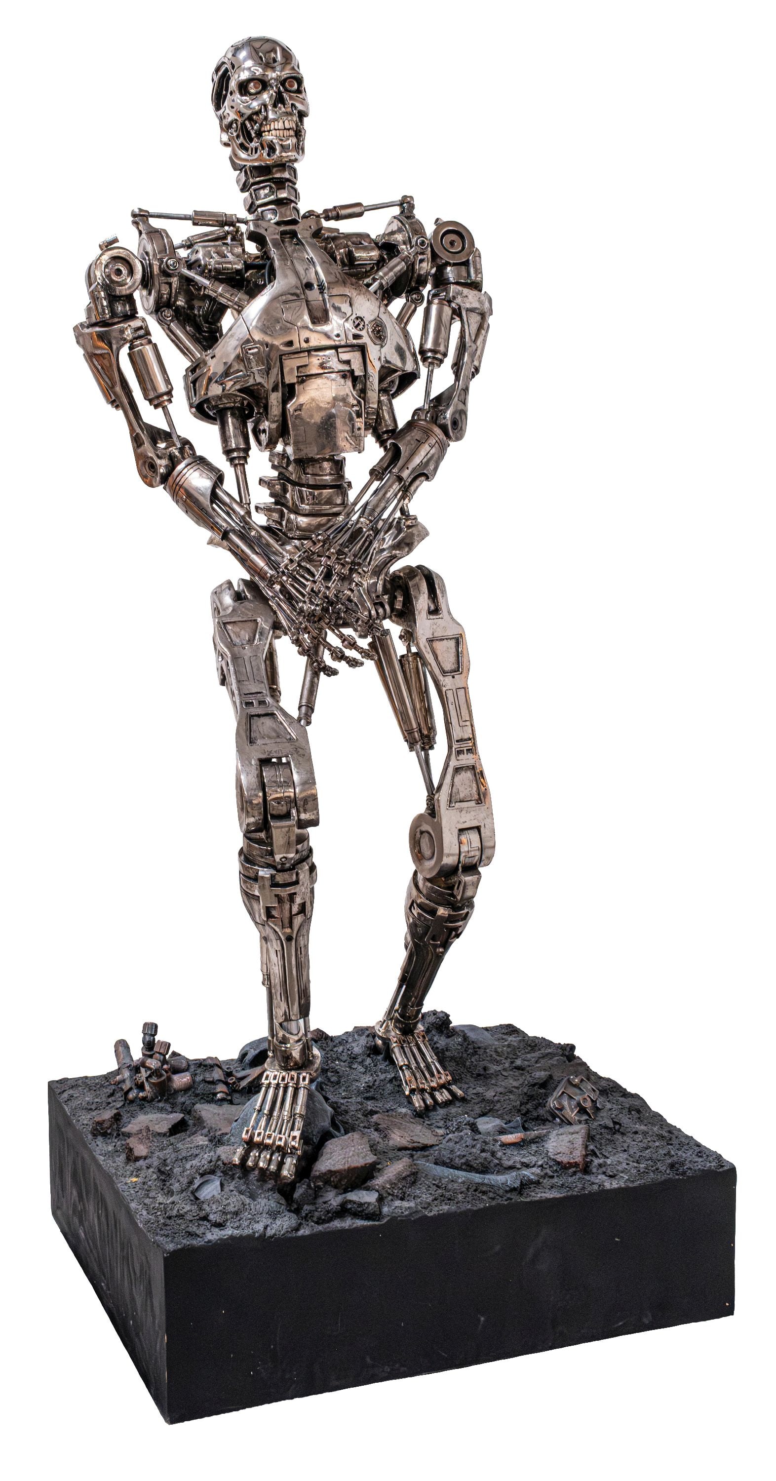 3D FIGURAL DISPLAY OF TERMINATOR SKELETON: CONDITION: Shows near-perfect condition, with all metal construction on the original base. Some light oxidation to all the metal components. This is not a standard shippable item and will require 3rd 