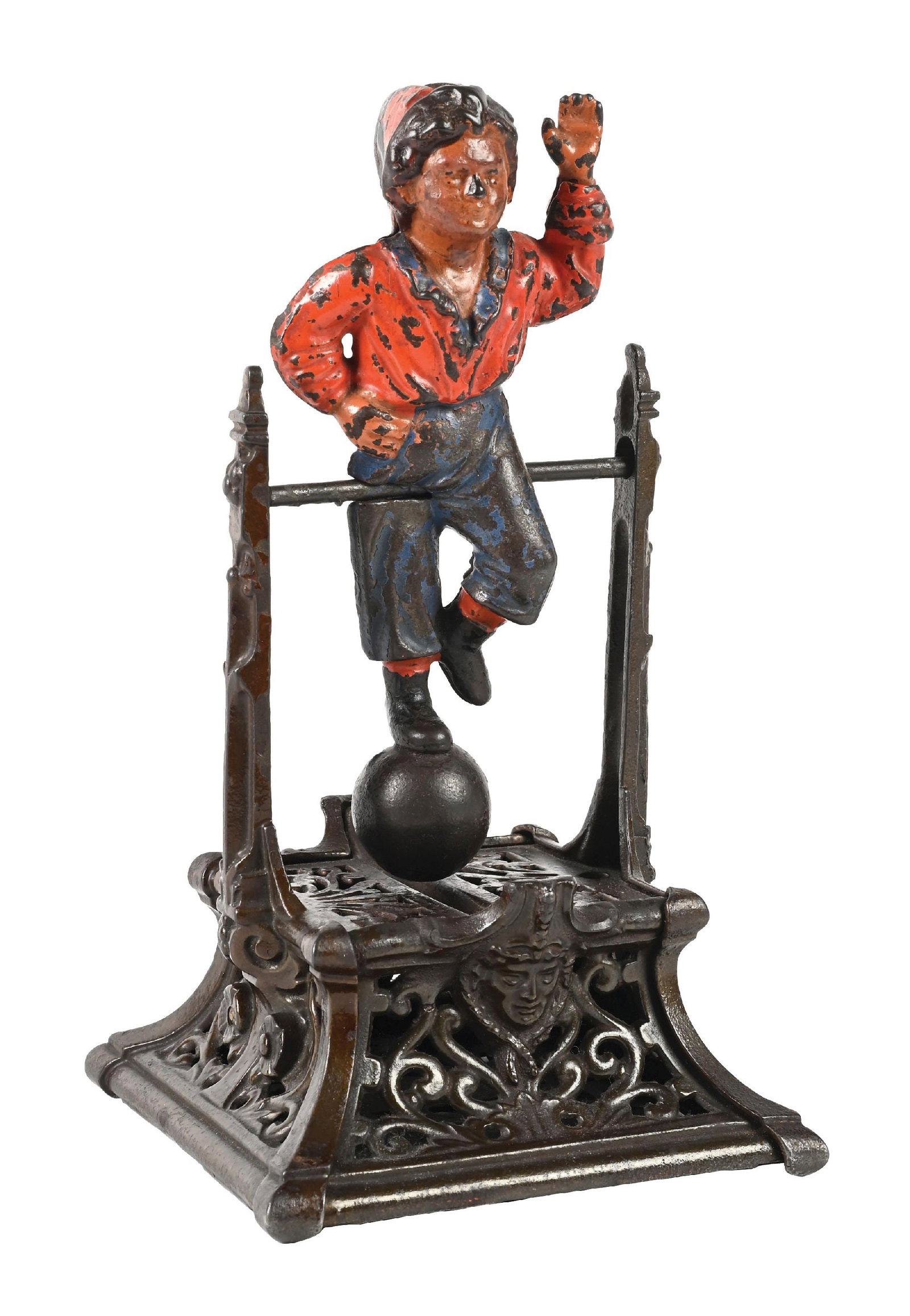 J. BARTON SMITH BOY ON TRAPEZE BANK: No breaks or repairs. Boy's face and chest touched-up. Condition: (Very Good). Dimensions: 5" x 5" x 9 - 1/4".