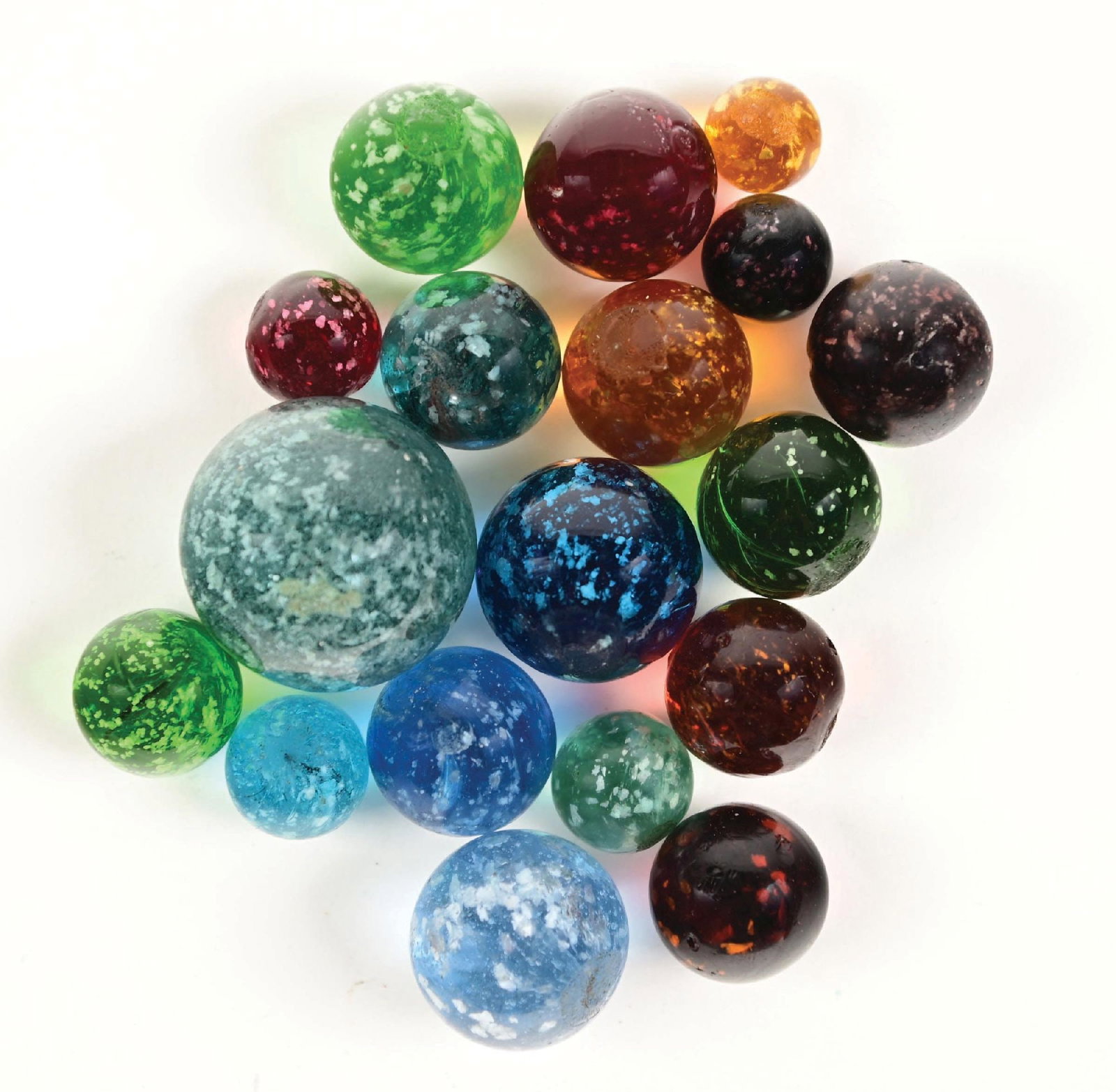 LOT OF 18: MICA MARBLES: 9/16" - 1-1/4" diam. Lot includes 5 aqua, 2 light blue, 4 amber, 3 green, 2 purple, and 2 red micas. The red micas are in very good condition. Condition: (9.2 average). Dimensions: