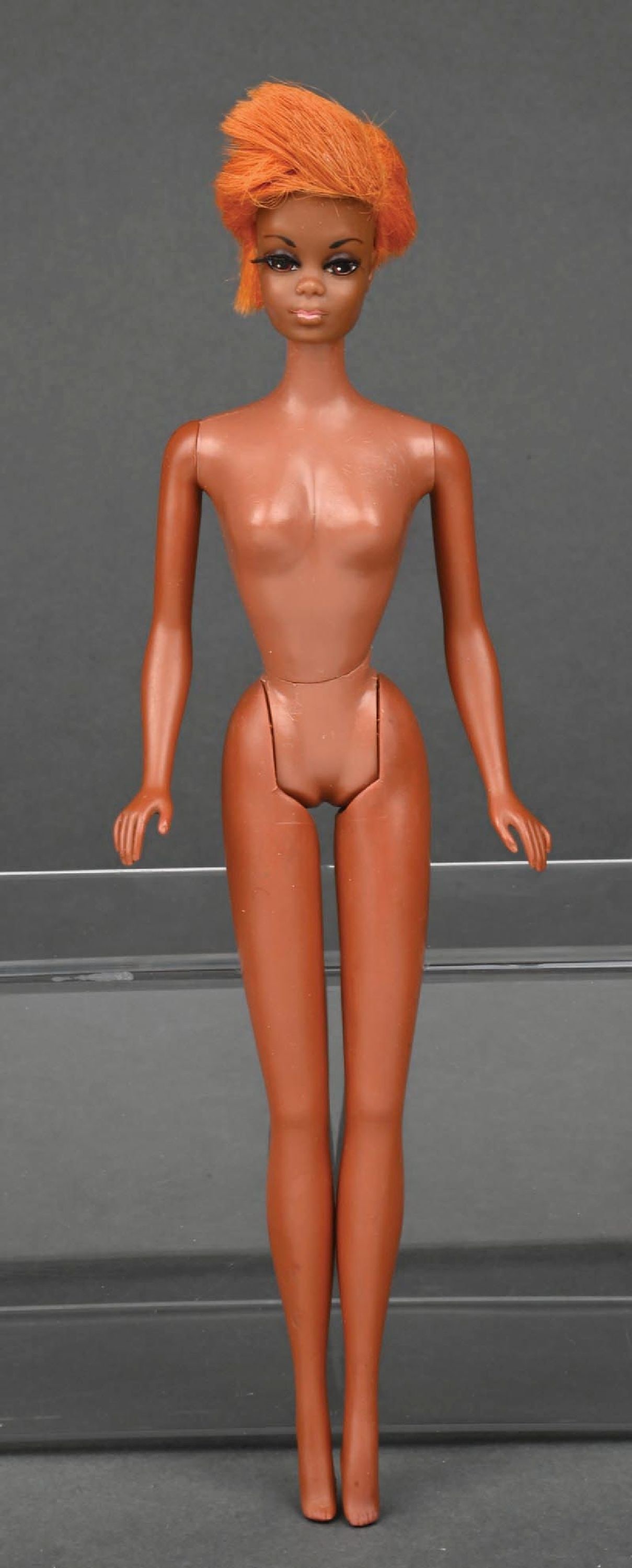 1960S JULIA TWIST 'N TURN BLONDE BARBIE DOLL WITH CLOTHING: Lot consists of a vintage Julia Twist 'n Turn Barbie Doll. She comes with straight legs, with some eyelashes left, and with holes in her feet. Includes four pieces of clothing: a Pink Fantasy #1754, a