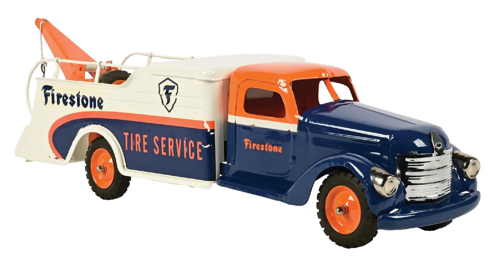 PRESSED STEEL FIRESTONE TIRE SERVICE TRUCK: New decals. Condition: (Restored). Dimensions: 6" x 23 - 1/2" x 8".