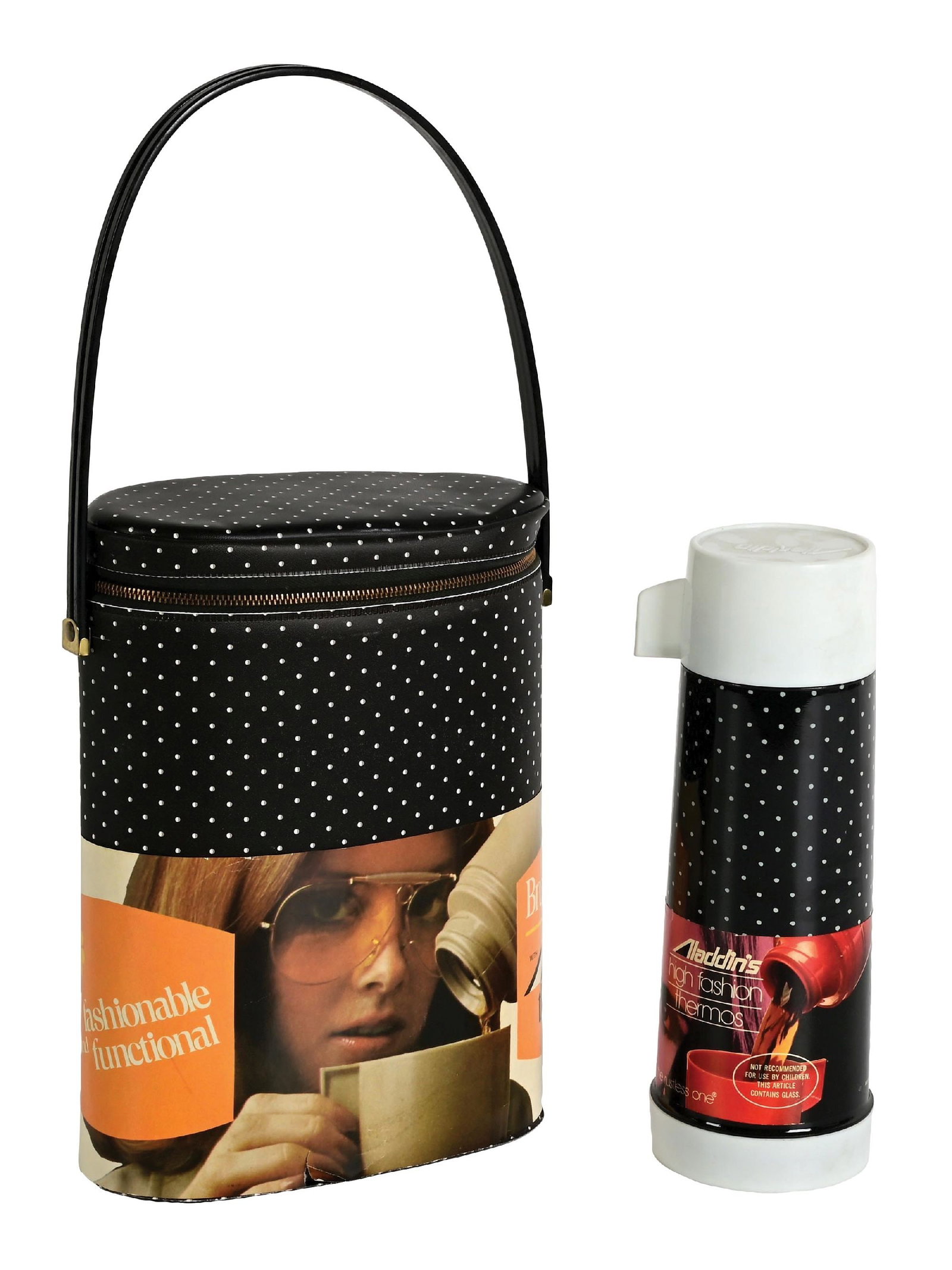 BLACK POLKA DOTED FASHIONABLE LUNCH/ BRUNCH BAG WITH THERMOS: C. 1969. A glorious rare "white dot" brunch bag and matching thermos. The brunch bag has its original paper label, as does the thermos, and the brunch bag includes its paper cleaning instructions as w