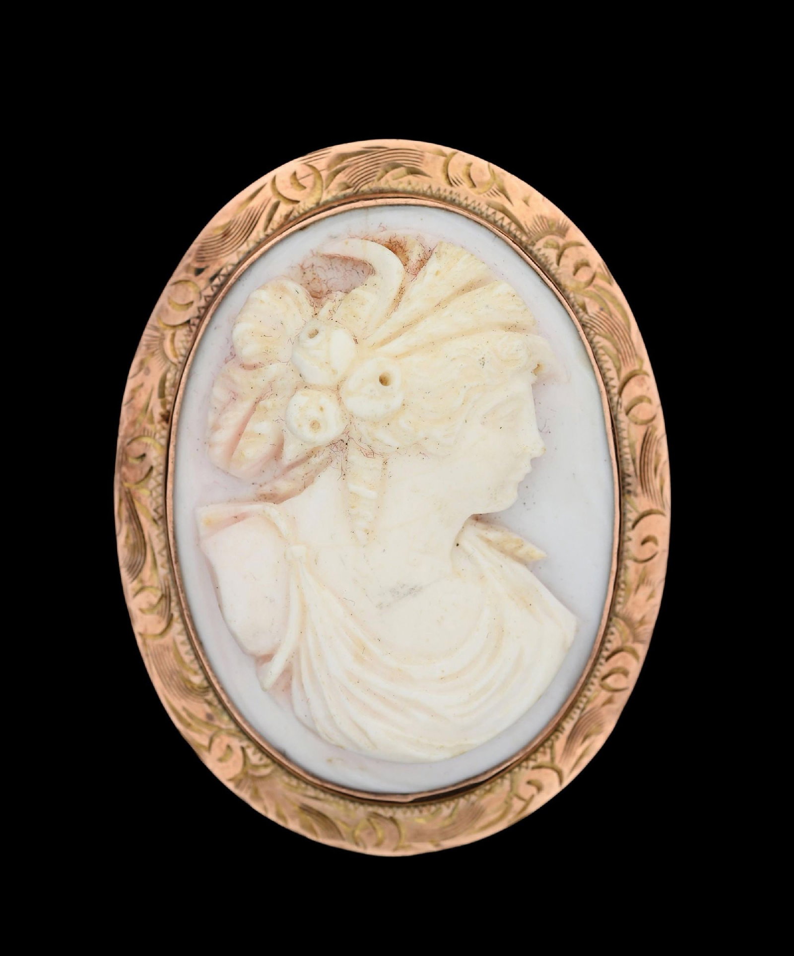 ANTIQUE 10K GOLD CARVED CAMEO BROOCH/PENDANT: Antique 10k yellow gold carved shell cameo brooch/pendant measuring 2" by 1-3/4". Gross weight is 13.4 grams. Marked "10K". Condition: (Very Good-Excellent). Dimensions: