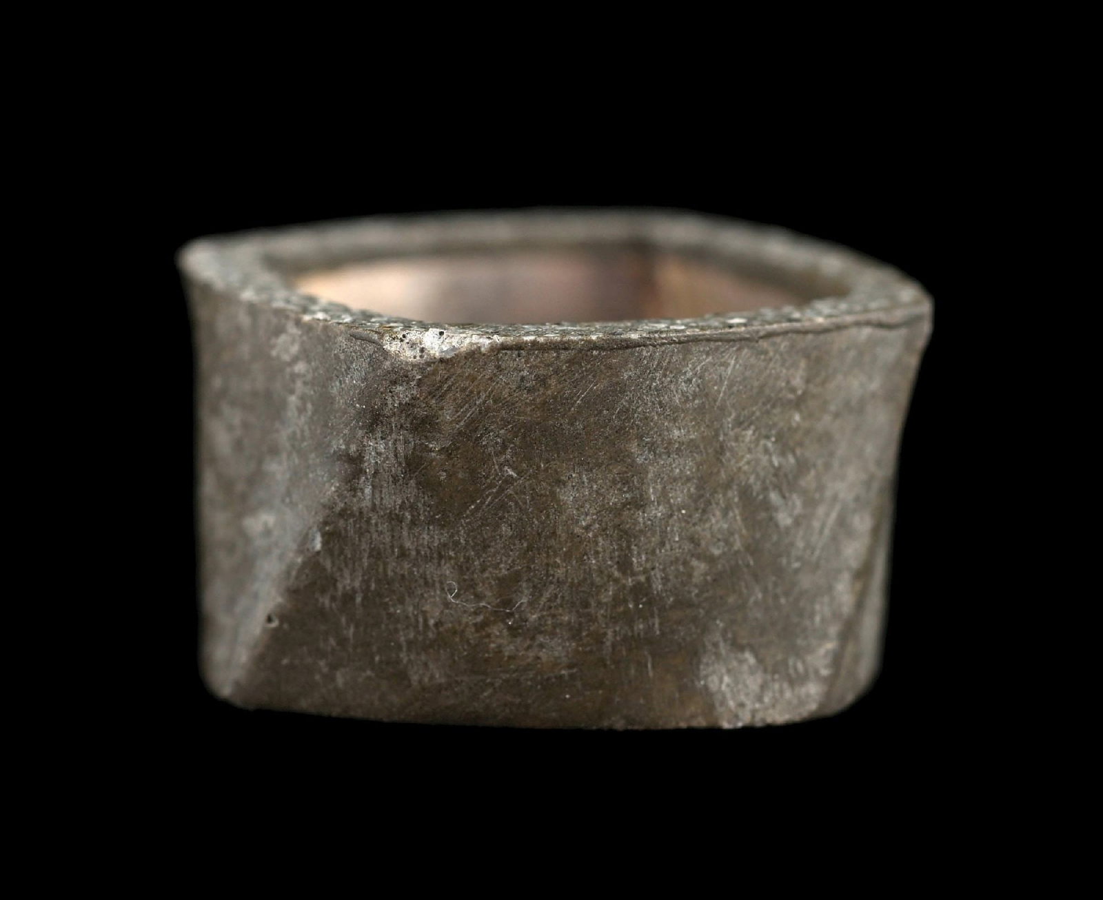 FRANK GEHRY FOR TIFFANY & CO TORQUE RING IN CONCRETE & SILVER: Frank Gehry for Tiffany & Co., "Torque" ring in concrete and sterling silver. Ring size 6. Gross weight is 8.0 grams. Width measures 12.5mm. Marked "Tiffany & Co. (c) Gehry 925". Condition: (Excellent