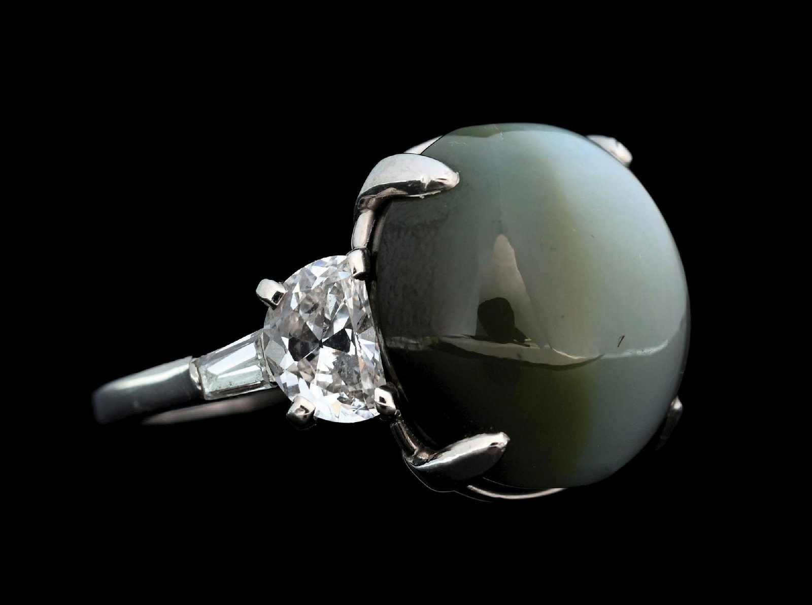 PLATINUM CAT'S-EYE ALEXANDRITE & DIAMOND RING W/GIA REPORT: Ladies' platinum natural cat's-eye alexandrite cabochon and diamond ring accompanied by an original GIA alexandrite origin report. Based on the GIA measurements, the center stone has an estimated weig