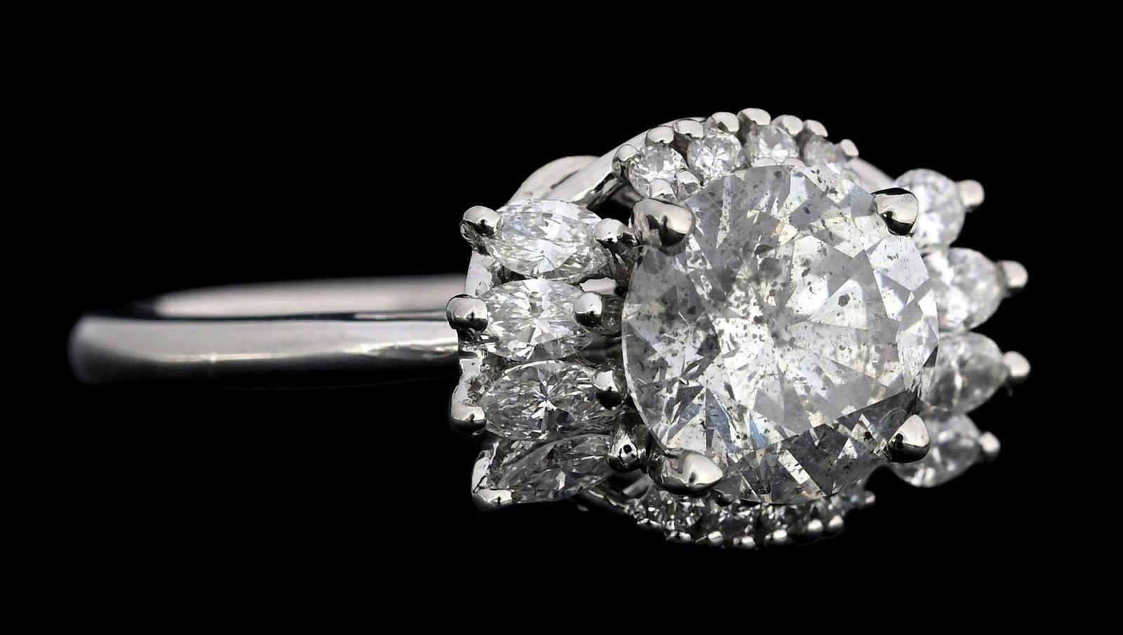 PLATINUM DIAMOND RING WITH W/REPORT: Ladies' platinum diamond (center: 1.52ct, sides: 1.95ctw) engagement ring accompanied by an original AIGL appraisal report with an ERRV of $22,735.00 (See additional website images of report for speci