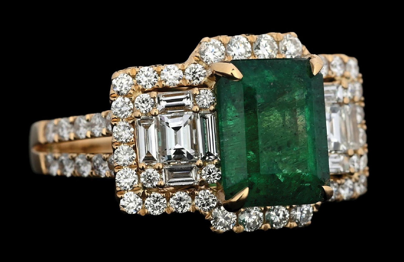 18K GOLD EMERALD & DIAMOND RING W/APPRAISAL: Ladies' 18k yellow gold emerald (2.74ct) and diamond (1.29ctw) ring accompanied by an original IAS appraisal report with an ERRV of $15,825.00 (See additional website images of report for specificatio