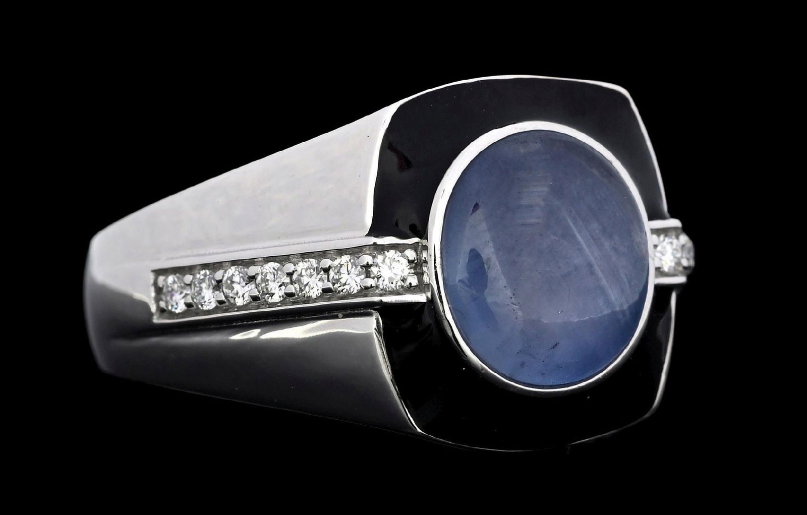 PLATINUM STAR SAPPHIRE & DIAMOND ENAMELED RING W/REPORT: Platinum star sapphire (4.81ct) and diamond (0.20ctw) enameled ring accompanied by an original AIGL appraisal report with an ERRV of $19,500.00 (See additional website images of report for specificati
