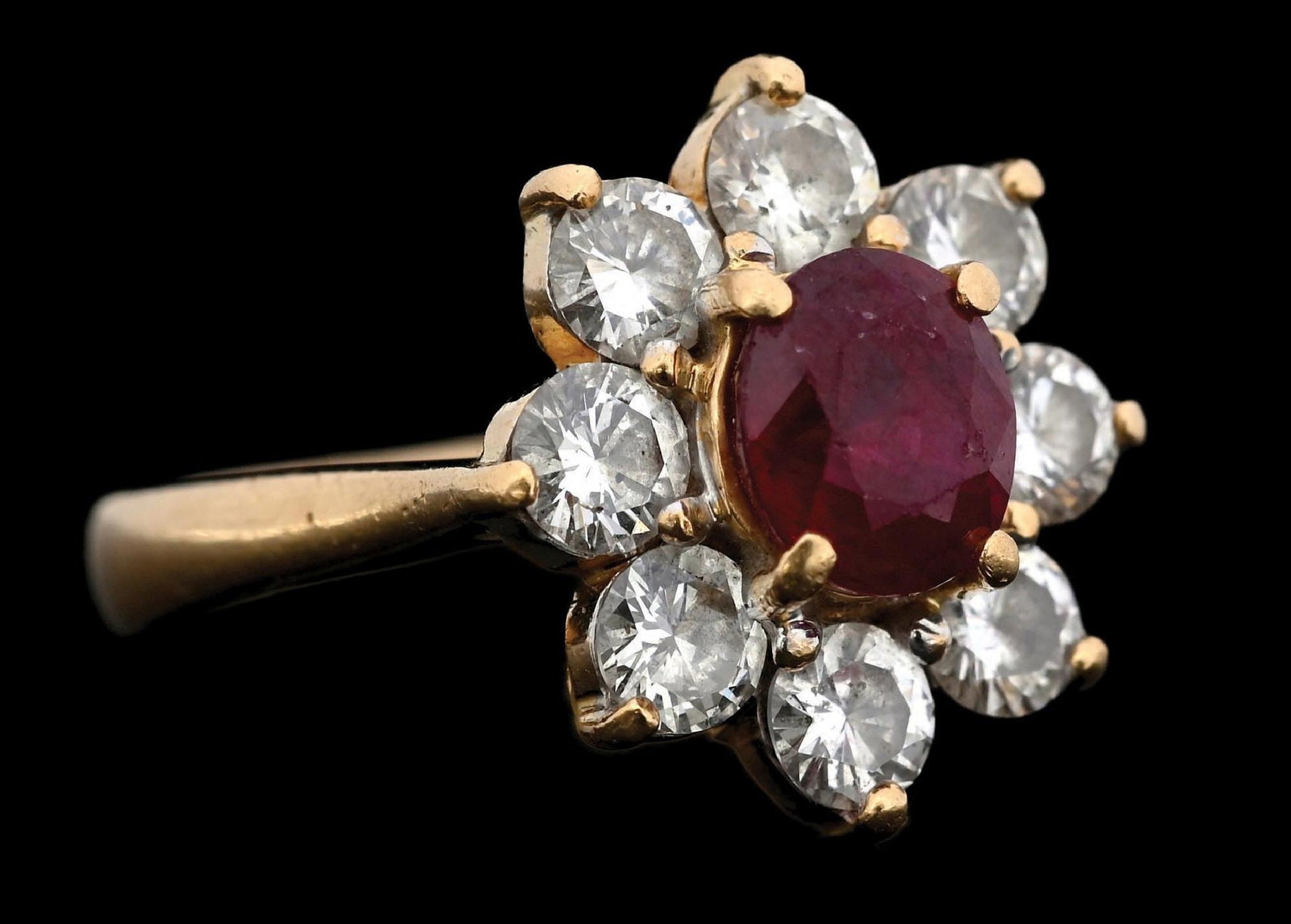 18K GOLD RUBY & DIAMOND RING W/APPRAISAL: Ladies' 18k yellow gold ruby (0.75ct) and diamond (1.28ctw) ring accompanied by an appraisal report (copy) with an ERRV of $3,992.00 (See additional website images of report for specifications).