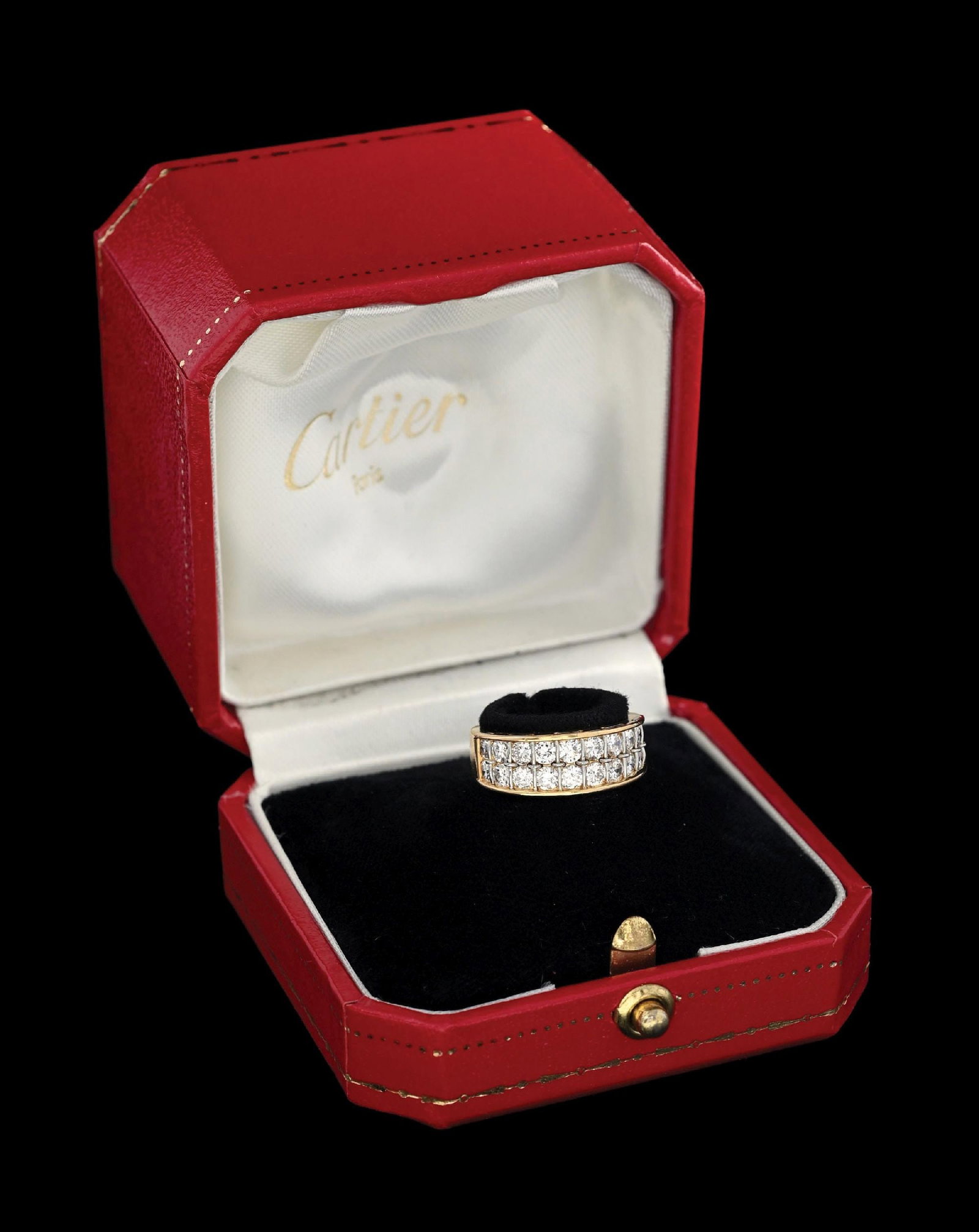18K GOLD CARTIER SERENADE DIAMOND RING W/ORIGINAL BOX: Ladies' vintage 18k two-tone yellow and white gold Cartier "Serenade" diamond band consisting of 20 round brilliant cut natural diamonds with an estimated total weight of 1.35cts. Ring size 4-1/2.