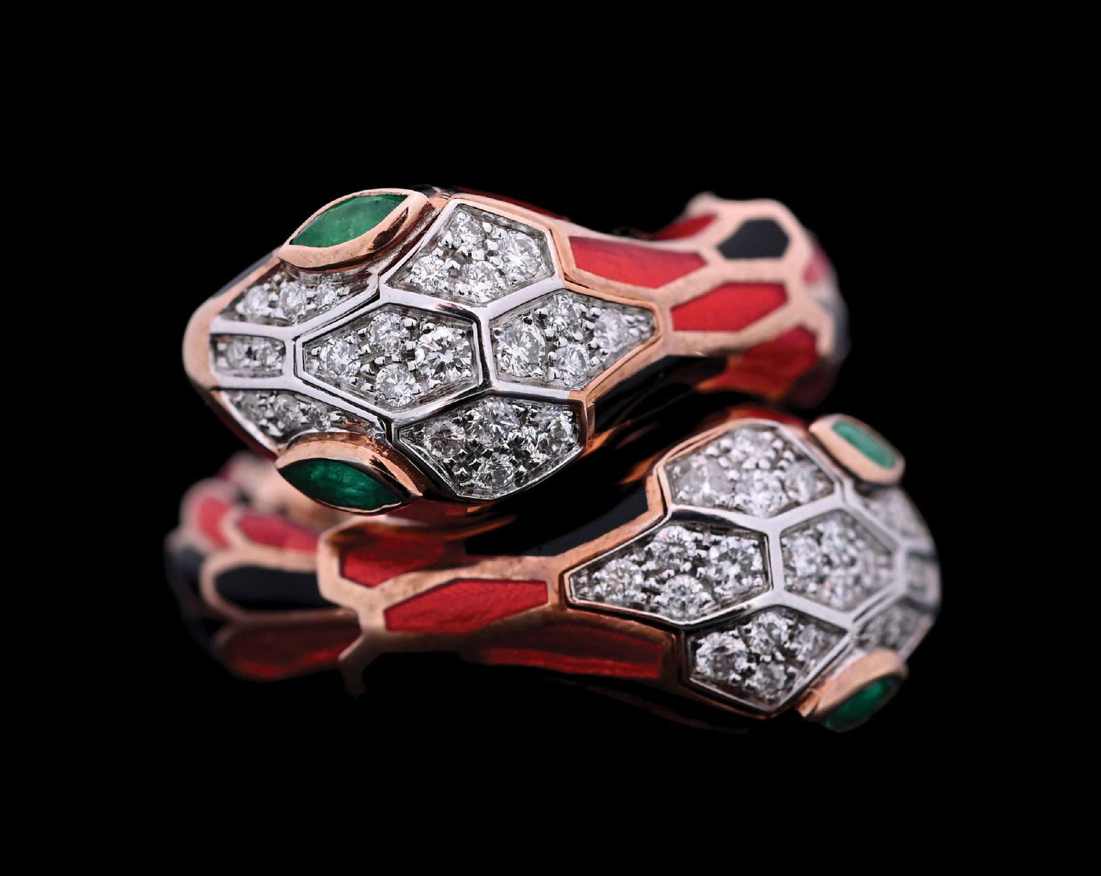 18K PINK GOLD ENAMELED DIAMOND & EMERALD SNAKE RING BY ALEXIS NY: Ladies' 18k pink gold and sterling silver enameled diamond and emerald designer snake ring. Ring size is flexible from 6 to 8. Gross weight is 14.3 grams. Width measures 22mm. Marked "750 925"