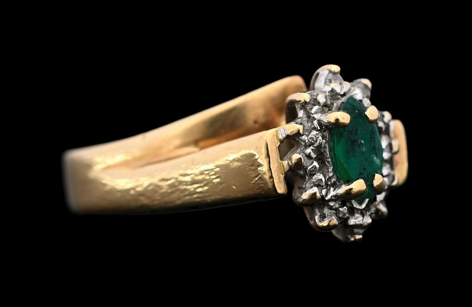 10K GOLD EMERALD & DIAMOND RING: Ladies' 10k yellow gold emerald and diamond ring. Width at top is 9.5mm. Ring size 5-1/5. Gross weight is 2.5 grams. Marked "10K". Condition: (Very Good). Dimensions: