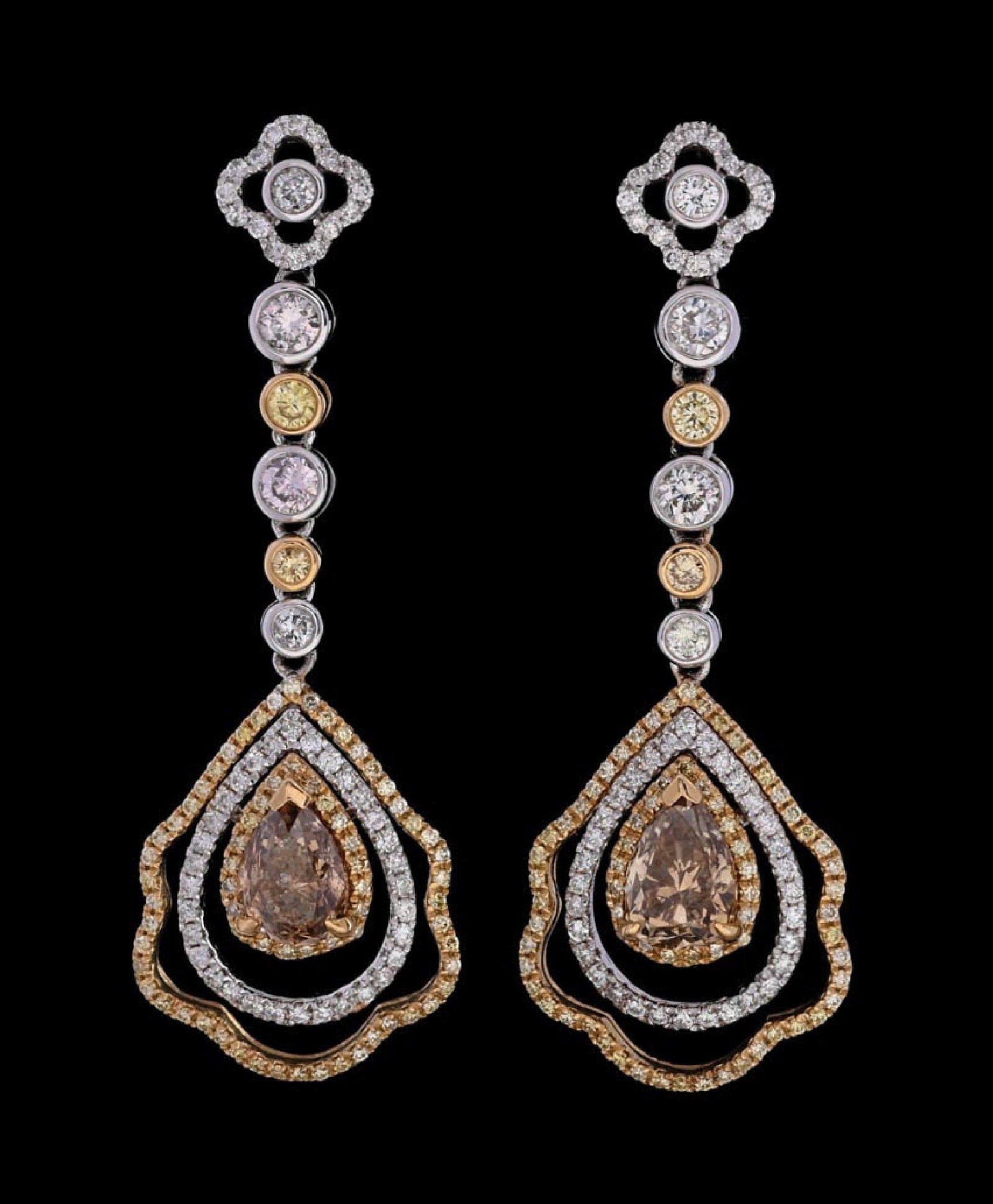 14K GOLD DIAMOND DANGLE EARRINGS W/REPORT: Ladies' 14k two-tone yellow and white gold diamond (3.64ctw) earrings accompanied by an original AIG appraisal report with an ERRV of $17,440.00 (See additional website images of report for specificat