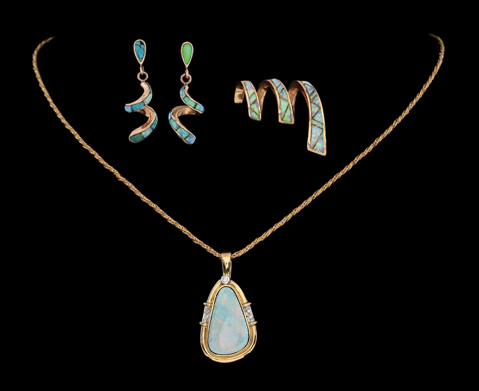 SET OF 3: 14K GOLD OPAL PENDANT & EARRINGS: Set of 3: 14k yellow gold opal doublet and diamond pendant, measuring 1-1/4" in length, on a 24" woven 14k yellow gold chain, one 14k yellow gold spiral slide/pendant with inlaid opals and a matching 
