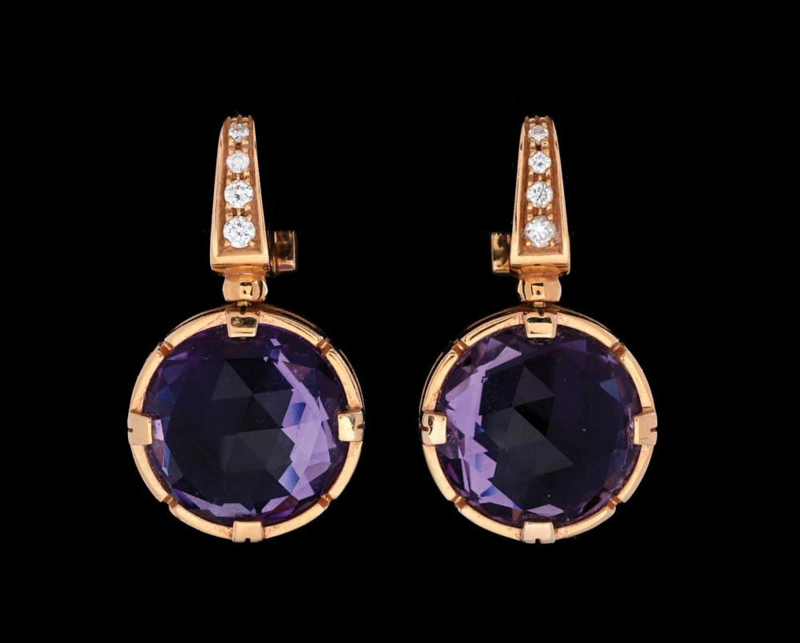 18K YELLOW GOLD AMETHYST BULGARI EARRINGS: Pair of ladies' 18k yellow gold Bulgari drop earrings set with amethyst and diamonds. Length measures 1-1/8". Gross weight 14.1 grams. Marked "BULGARI, 750". Condition: (Excellent). Dimensions: