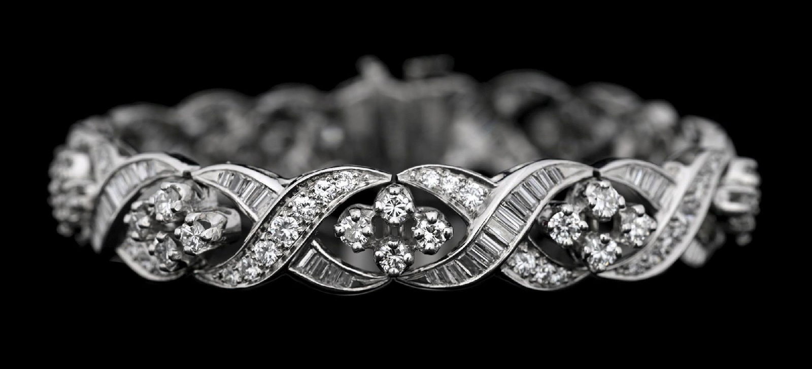PLATINUM 8.50CT TW DIAMOND BRACELET: Ladies' platinum diamond bracelet consisting of 210 mixed round brilliant cut and baguette cut natural diamonds with a total weight of 8.50cts. Gross weight is 37.0 grams. Length measures 7". Width me