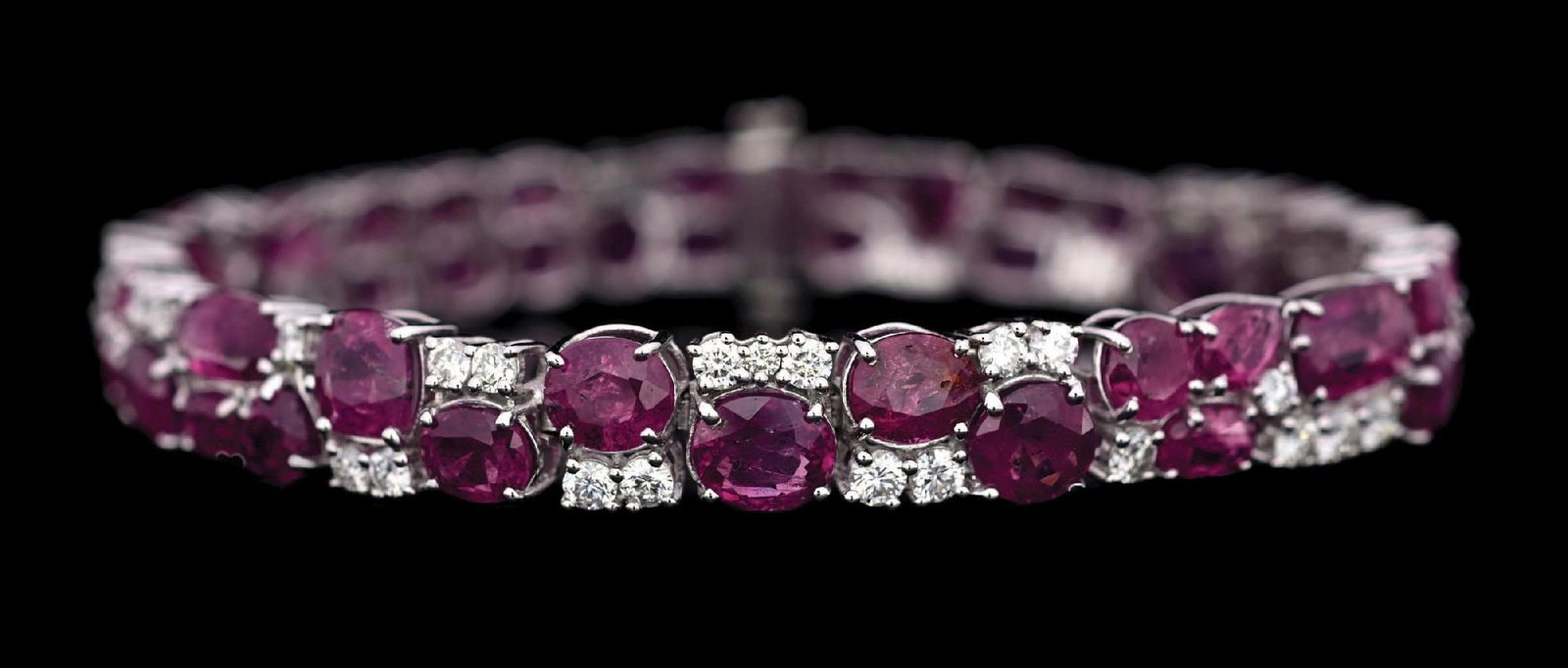 PLATINUM KASHMIR SAPPHIRE & DIAMOND BRACELET W/GIA REPORT: Ladies' platinum Kashmir sapphire (30.80ctw) and diamond (2.19ctw) bracelet accompanied by an original GIA sapphire origin report and a GGA appraisal report with an ERRV of $52,870.00 (See additional 