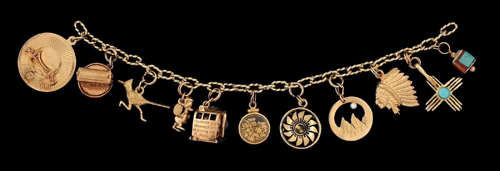 VINTAGE GOLD CHARM BRACELET: Ladies' gold bracelet with 11 charms. Bracelet is unmarked, untested and missing clasp. Ten charms are marked "14K". Length: 7". Gross weight: 44.7 grams. Condition: (Very Good). Dimensions: