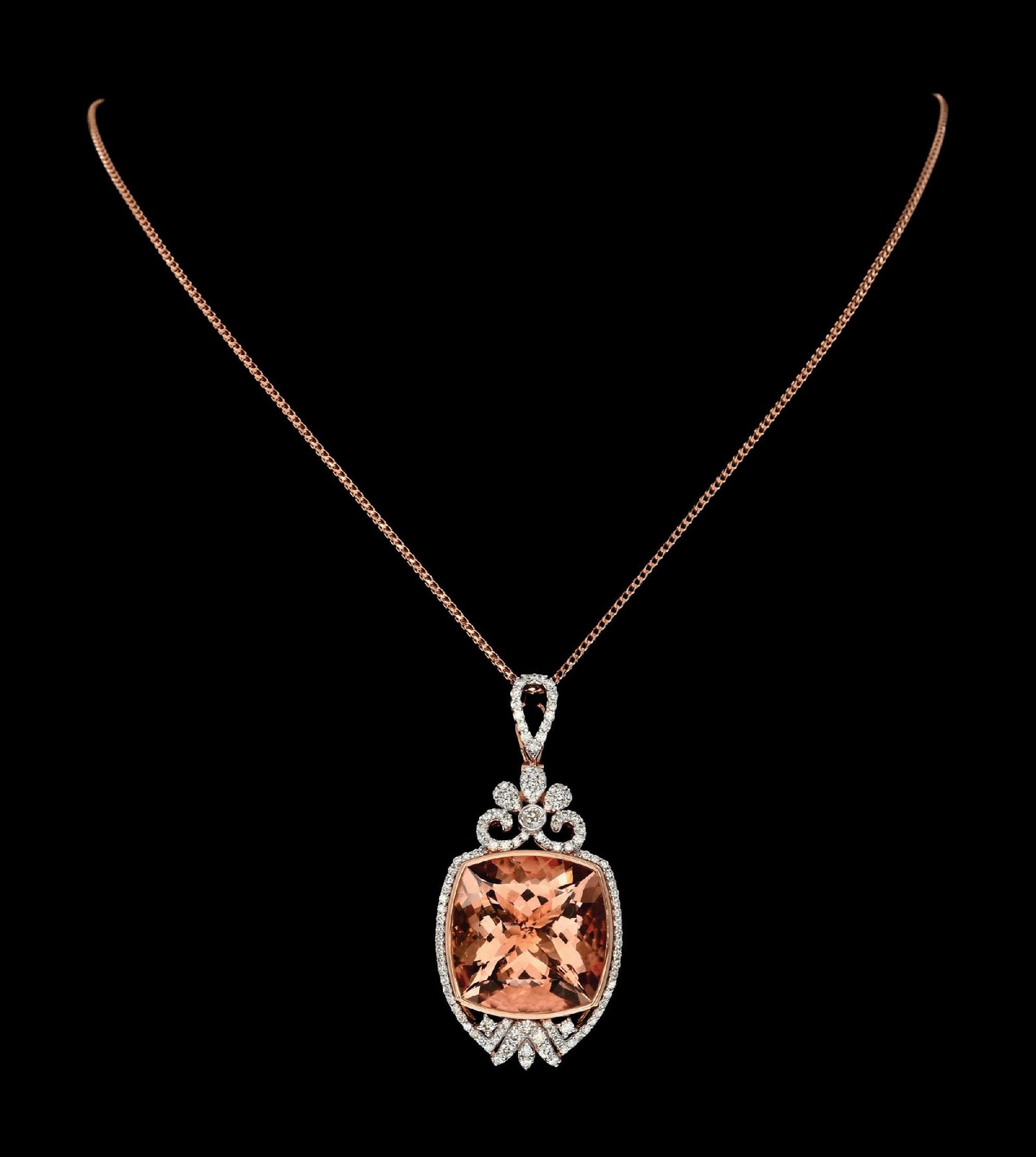 14K ROSE GOLD MORGANITE & DIAMOND NECKLACE W/ REPORT: Ladies' 14k rose gold morganite (22.61ct) and diamond (1.04ctw) pendant and chain accompanied by an original GGA appraisal report with an ERRV of $29,730.00 (See additional website images of report fo