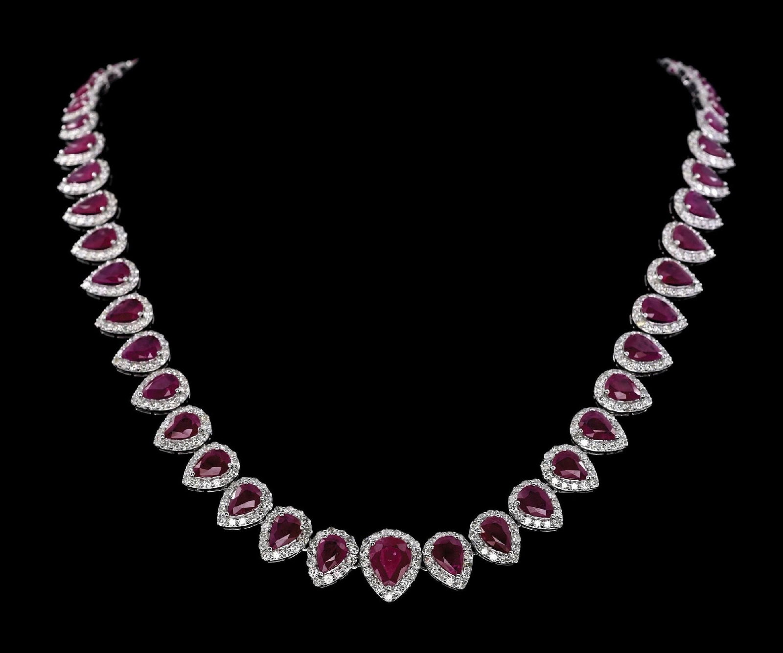 PLATINUM BURMESE RUBY & DIMOND NECKLACE W/GIA REPORT: Ladies' platinum Burmese ruby (27.38ctw) and diamond (10.32ctw) necklace accompanied by an original GIA ruby origin report and an AIGL appraisal report with an ERRV of $85,623.00 (See additional websi