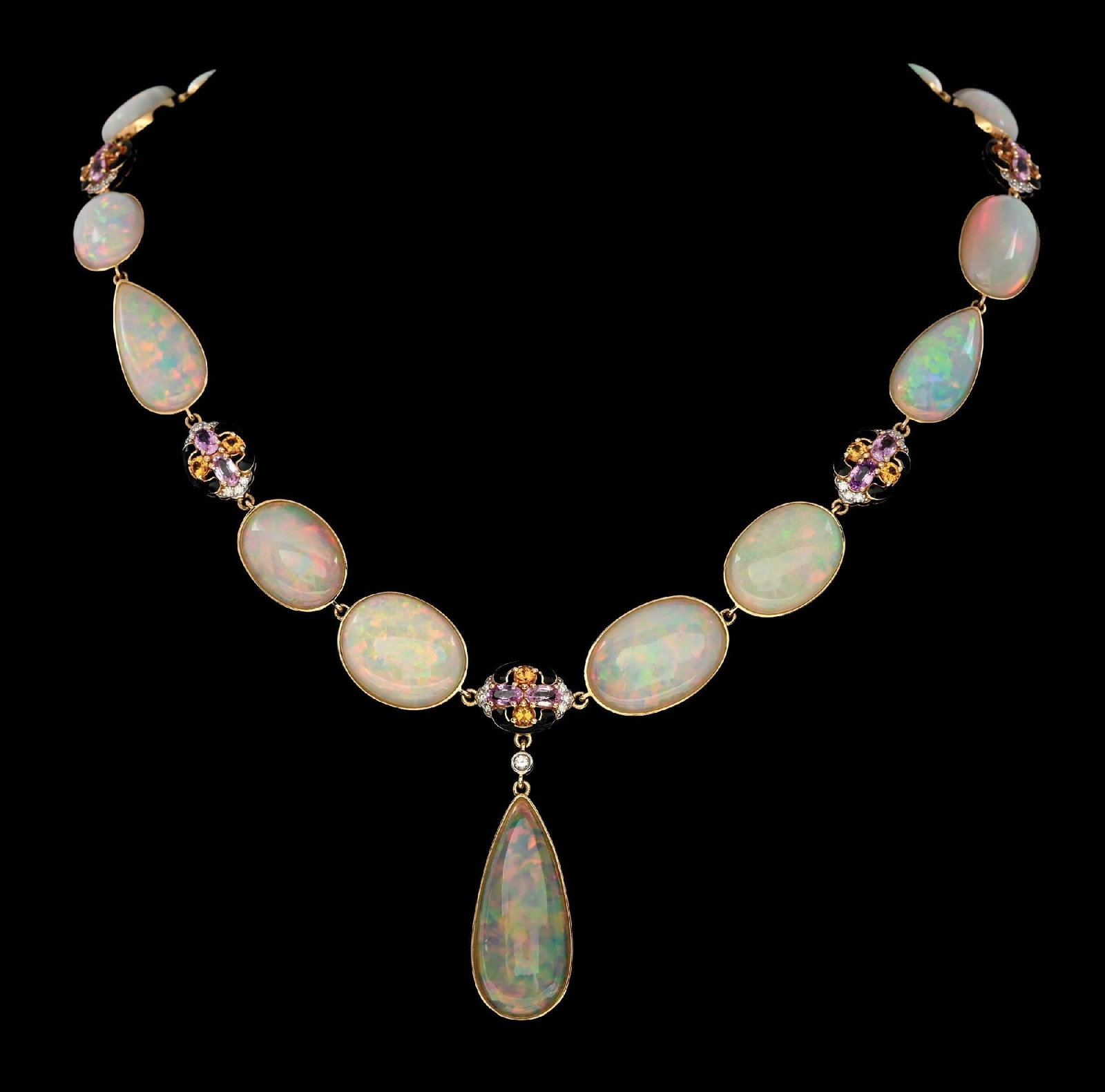 14K GOLD OPAL, SAPPHIRE & DIAMOND NECKLACE W/REPORT: Ladies' 14k yellow gold opal (80.39ctw), pink/yellow sapphire (6.29ctw) and diamond (0.62ctw) necklace accompanied by an original GGA appraisal report with an ERRV of $68,370.00 (See additional websit