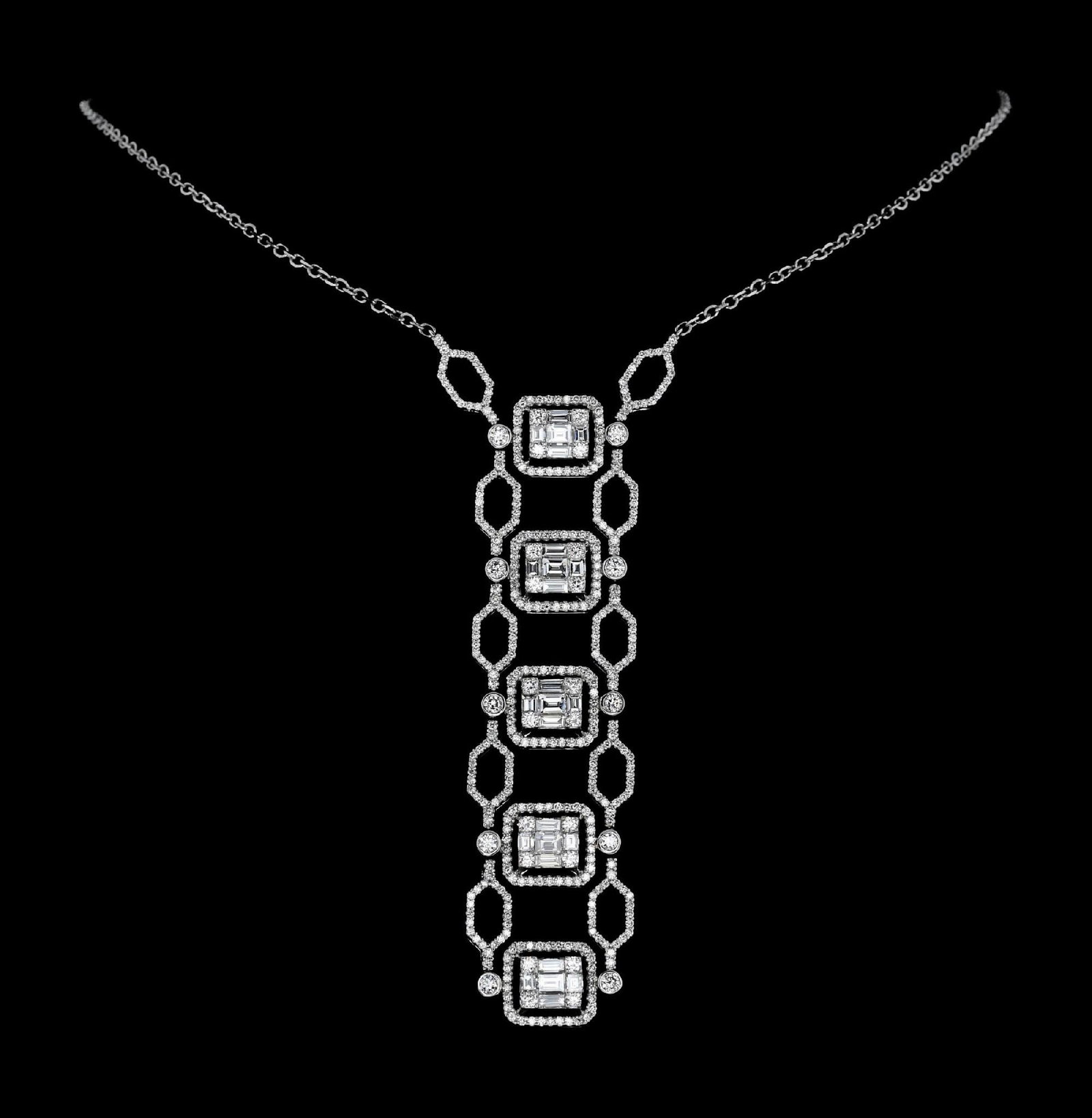 18K WHITE GOLD DILAMANI DIAMOND NECKLACE W/ APPRAISAL: Ladies' 18k white gold ornate diamond drop necklace by Dilamani set with mixed round and baguette cut diamonds with an approximate total weight of 3.20cts accompanied by an independent appraisal (copy