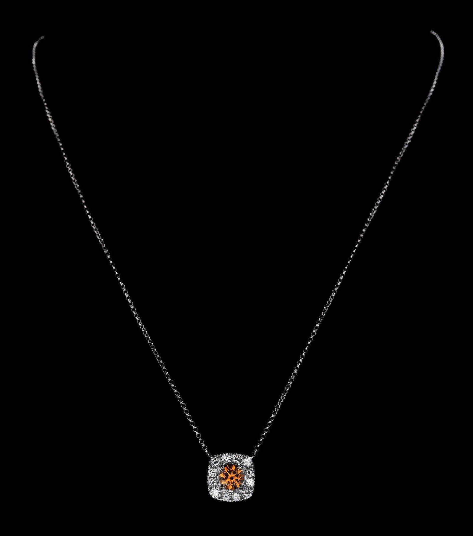 18K WHITE GOLD FANCY ORANGE DIAMOND NECKLACE W/GIA REPORT: Ladies' 18k white gold natural fancy deep brownish-yellowish-orange diamond (0.82ct) and white diamond (1.42ctw) necklace accompanied by an original GIA colored diamond report and an AIGL appraisal