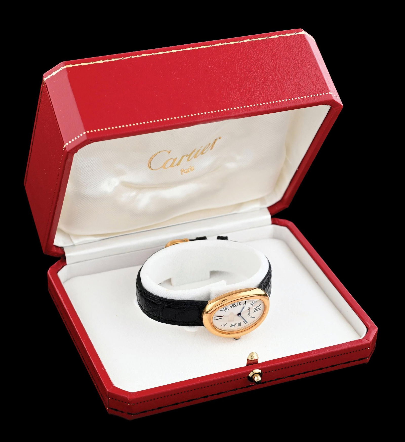 18K GOLD CARTIER BAIGNOIRE WRISTWATCH W/B&P: Ladies' vintage 18k yellow gold Cartier "Baignoire" wristwatch with matte ivory-white roman dial. Reference number 1954, circa 1996. Case diameter measures 22.5mm, length measures 31mm. Caseback marke
