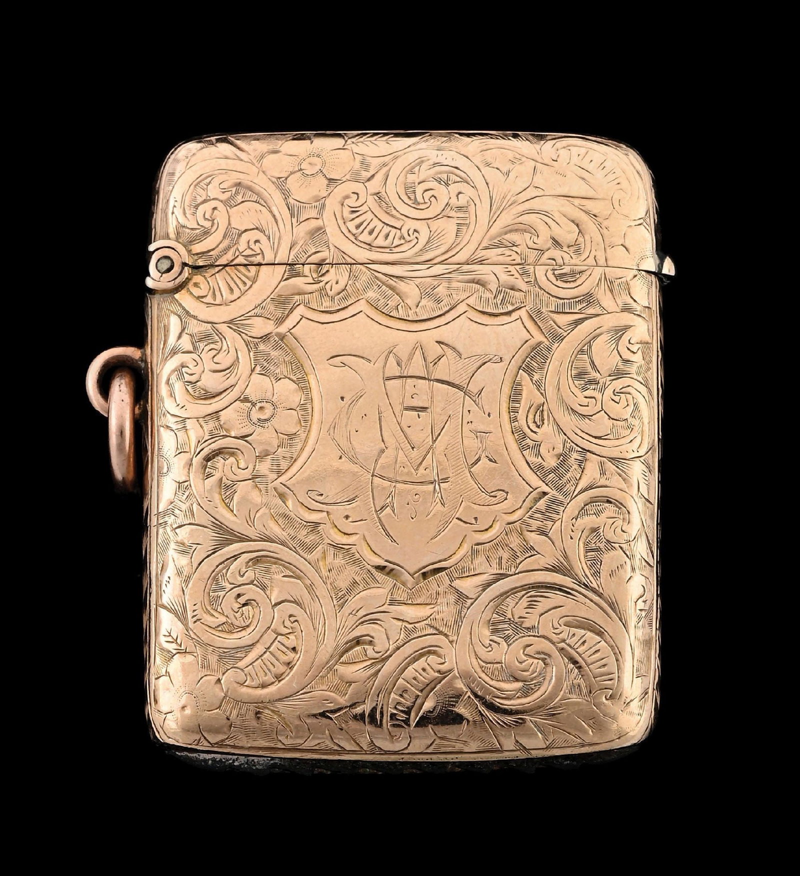 ENGLISH 9K GOLD MATCH SAFE: Nice scrolling design. Stamped and tests for 9K gold. 15.9 grams. From the portfolio of an avid and dedicated collector. Condition: (Excellent). Dimensions: 1 - 1/4" x 1 - 3/4".