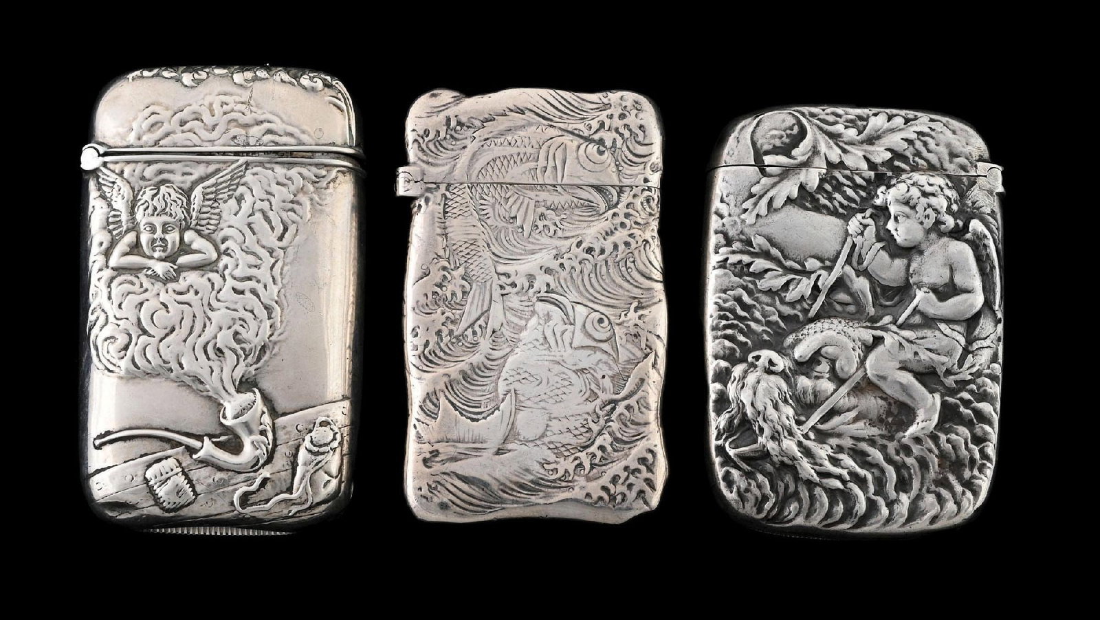 COLLECTION OF 3: STERLING SILVER MATCH SAFES: (A) Two Gorham. (B) One Hayden Manufacturing. From the portfolio of an avid and dedicated collector. Condition: Dimensions: Largest: 1 - 3/4" x 2 - 1/2".