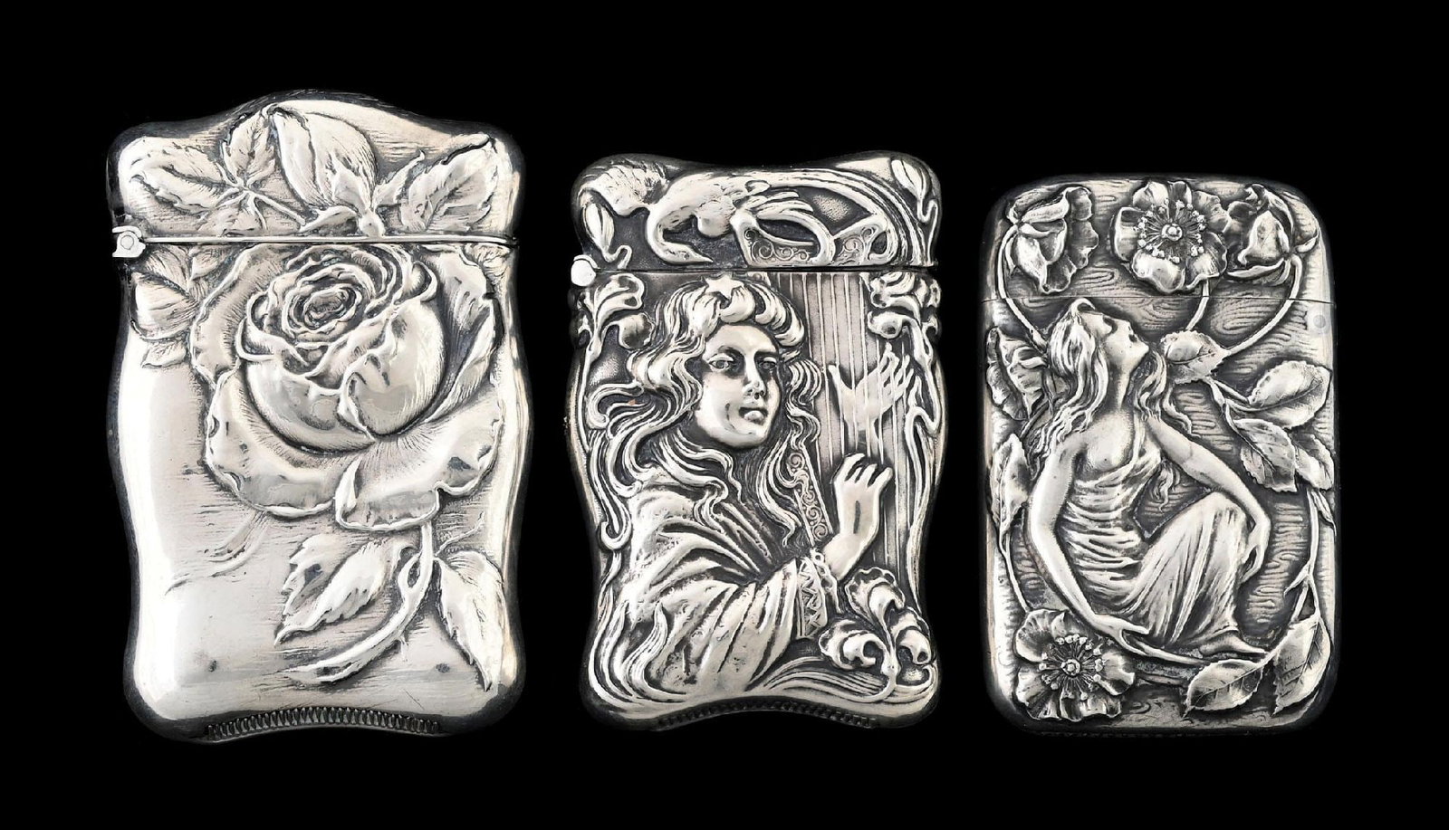 COLLECTION OF 3: STERLING SILVER MATCH SAFES: Includes 1 floral and 2 art nouveau-style match safes. From the portfolio of an avid and dedicated collector. Condition: Dimensions: Largest: 1 - 3/4" x 2 - 3/4".