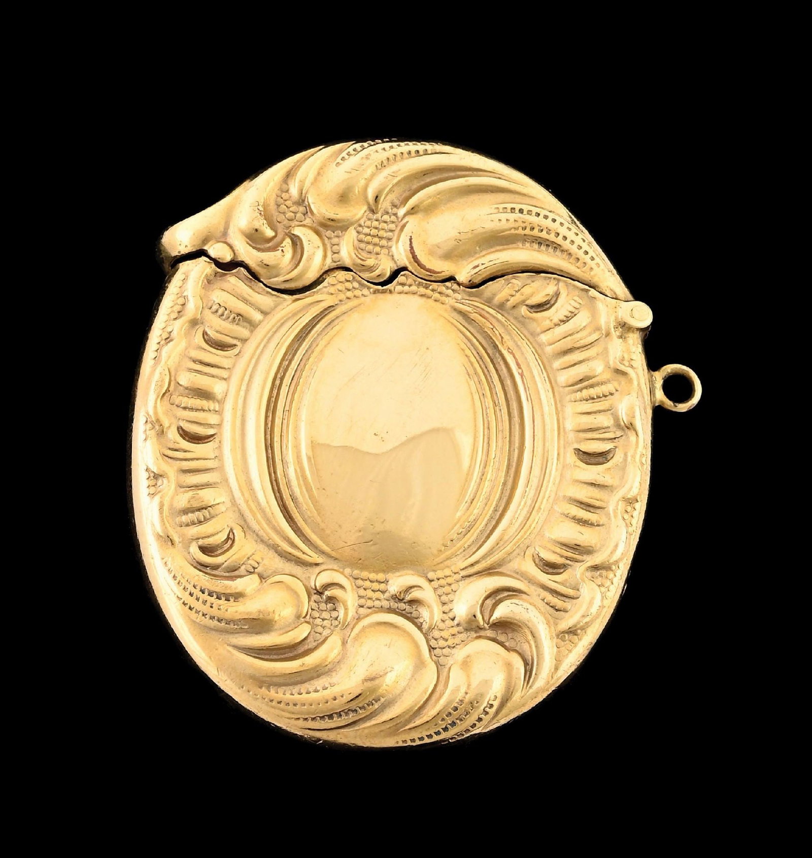 8K GOLD MATCH SAFE: Round shell-like design. Tests for 8K gold. 23.6 grams. From the portfolio of an avid and dedicated collector. Condition: (Excellent). Dimensions: 1 - 1/2" x 2".