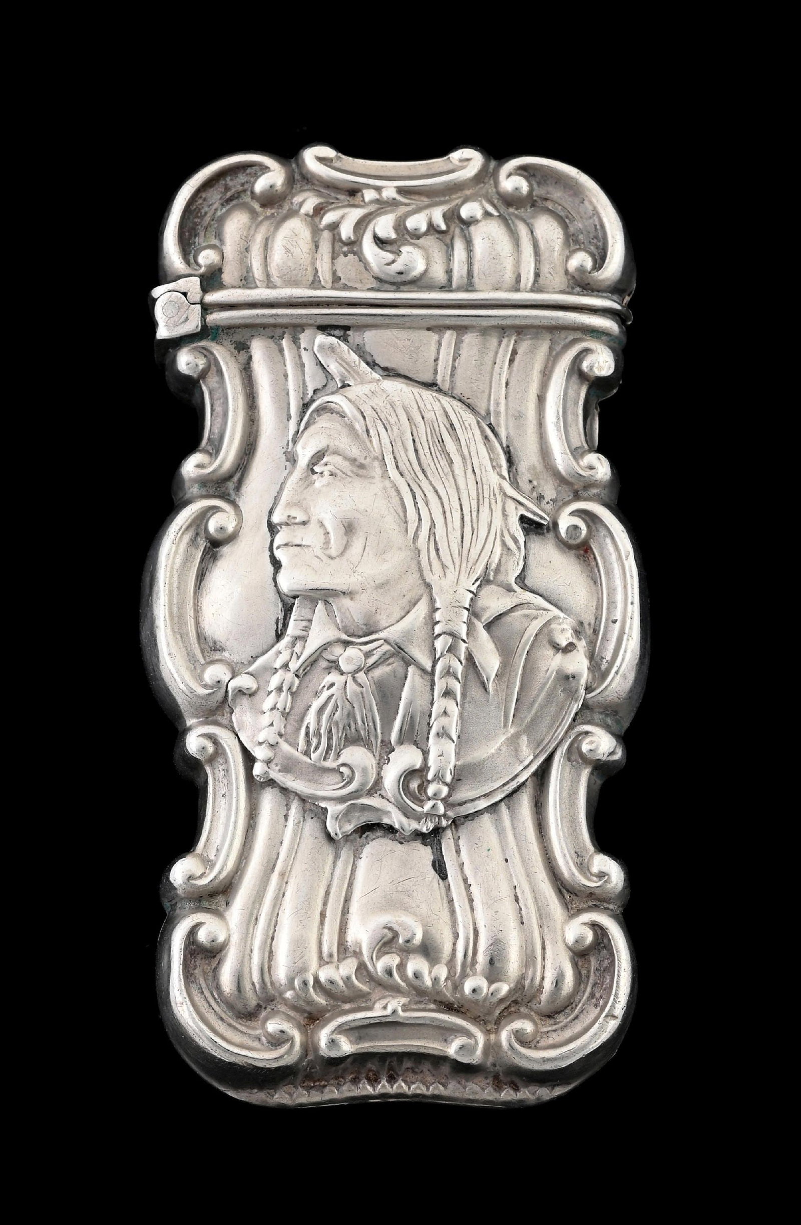 NATIVE AMERICAN INDIAN MATCH SAFE FRANK WHITING: Great image of native American Indian. Stunning detail. Made by Frank Whiting. From the portfolio of an avid and dedicated collector. Condition: Dimensions: 1 - 1/4" x 2 - 1/2".