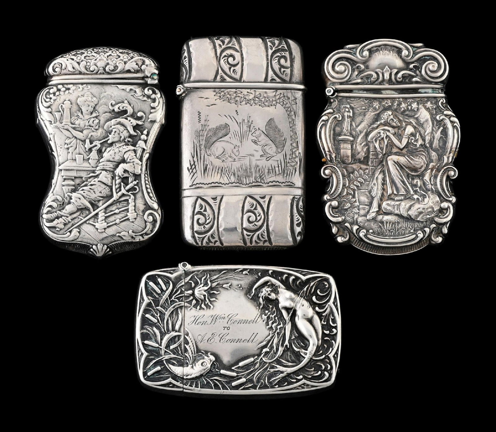 COLLECTION OF 4: STERLING SILVER MATCH SAFES: Includes R. Wallace Musketeer and Battin mermaid and fish. From the portfolio of an avid and dedicated collector. Condition: Dimensions: Largest: 1 - 1/2" x 2 - 1/2".