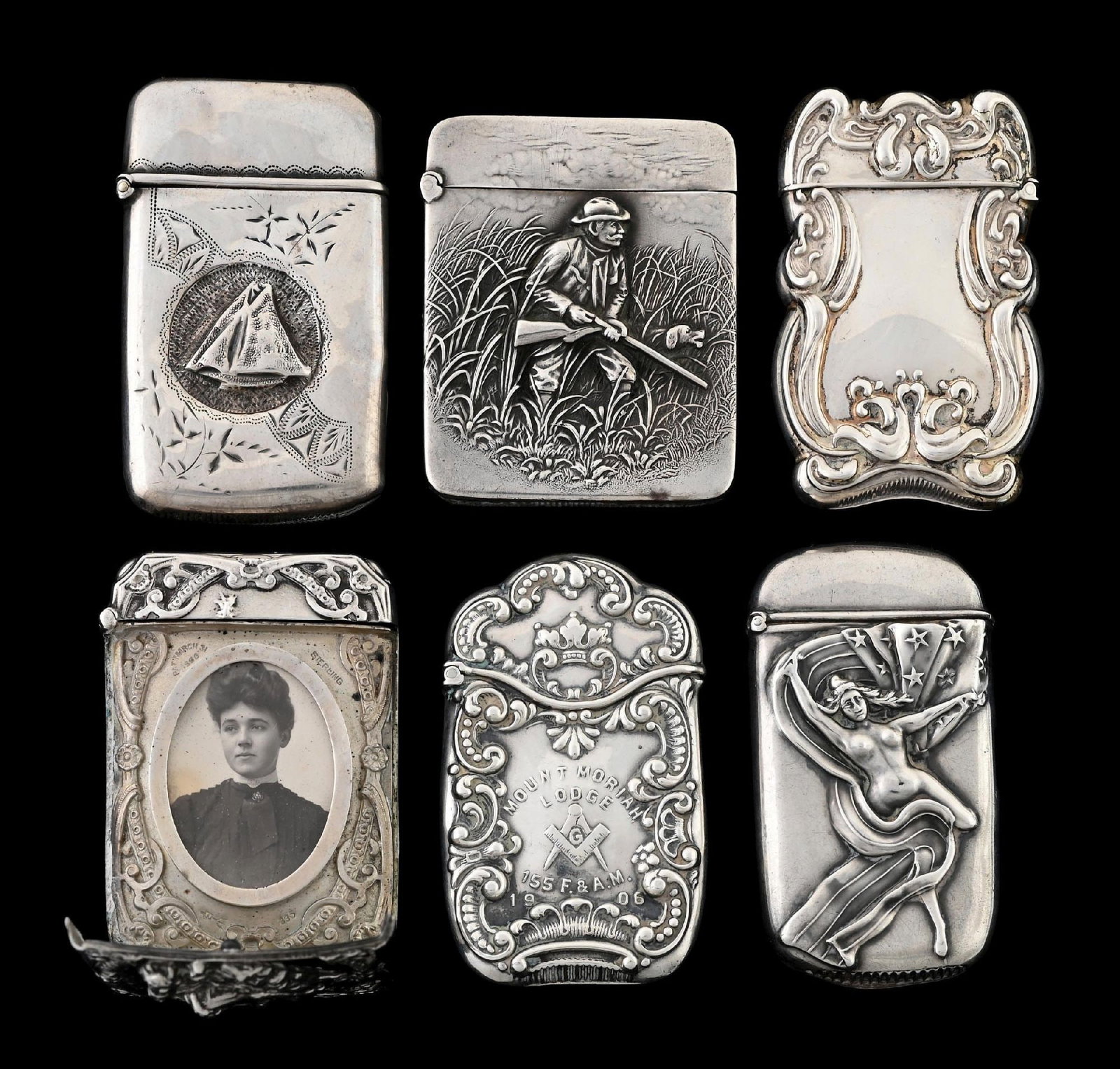 COLLECTION OF 6: STERLING SILVER MATCH SAFES: Includes hidden photo by Battin. From the portfolio of an avid and dedicated collector. Condition: Dimensions: Largest: 1 - 3/4" x 2 - 1/4".